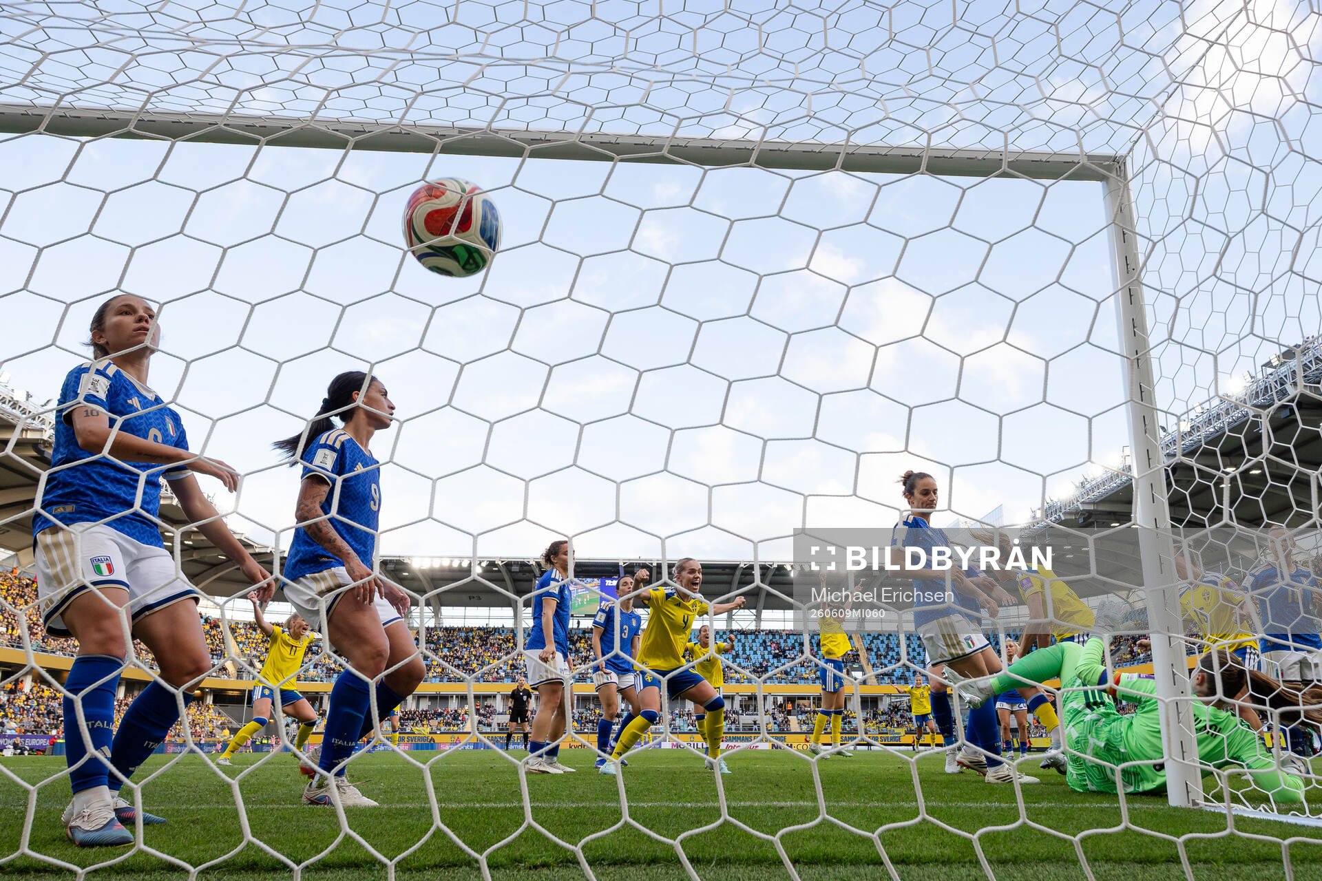 Fridolina Rolfö of Sweden scores 2-2 behind goalkeeper