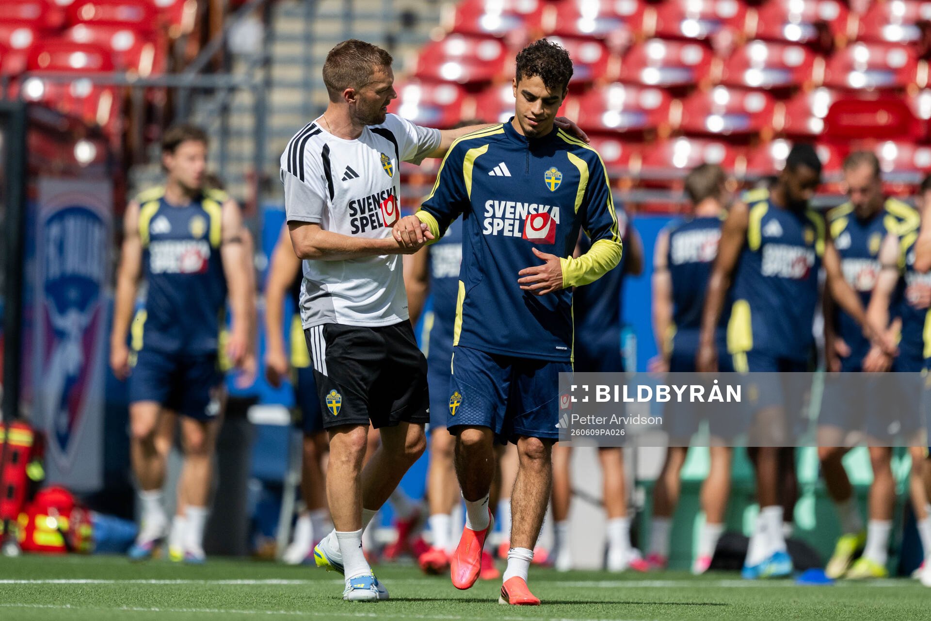 Assistant coach Sebastian Larsson and Yasin Ayari of the