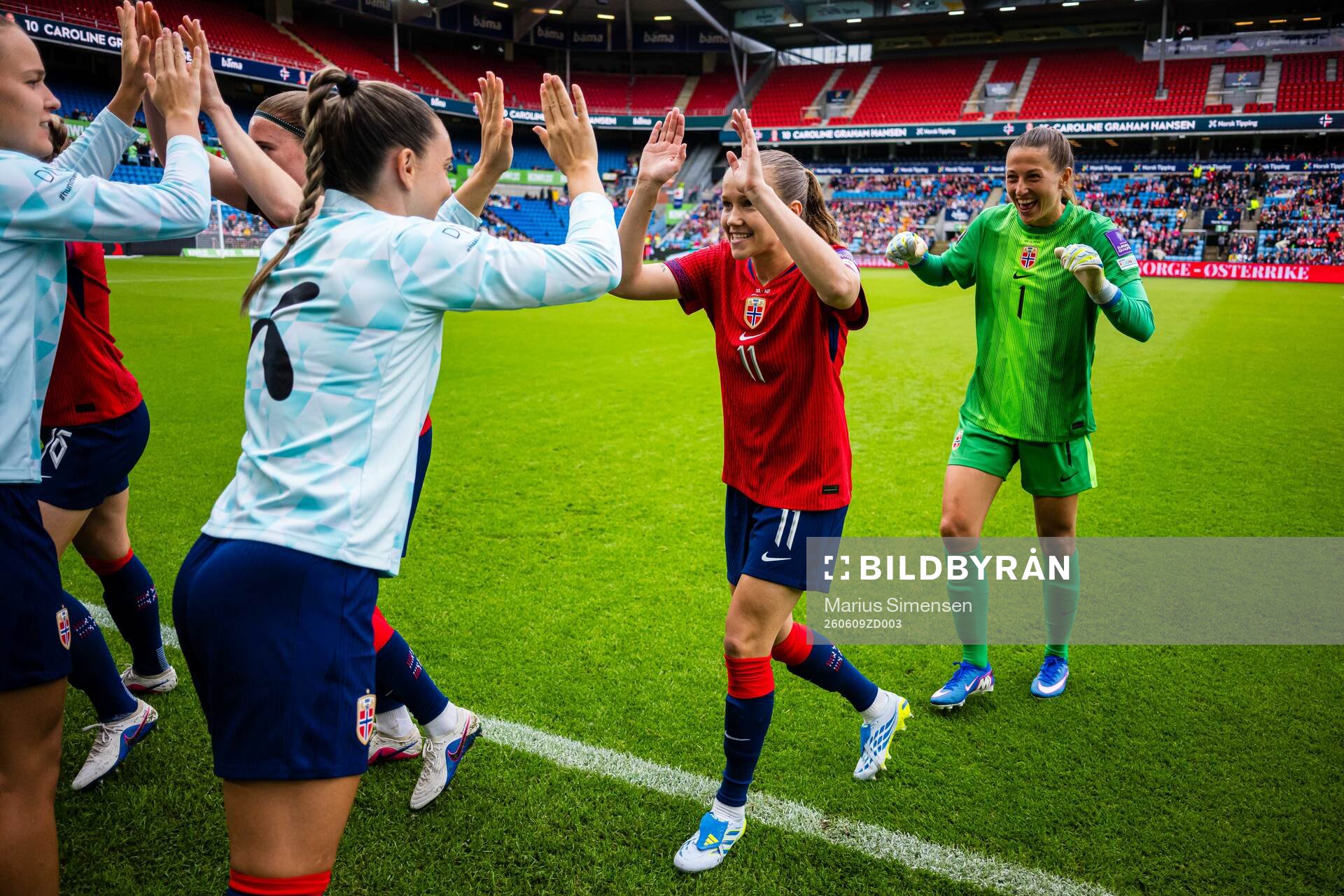 Guro Reiten and goalkeeper Cecilie Fiskerstrand of Norway