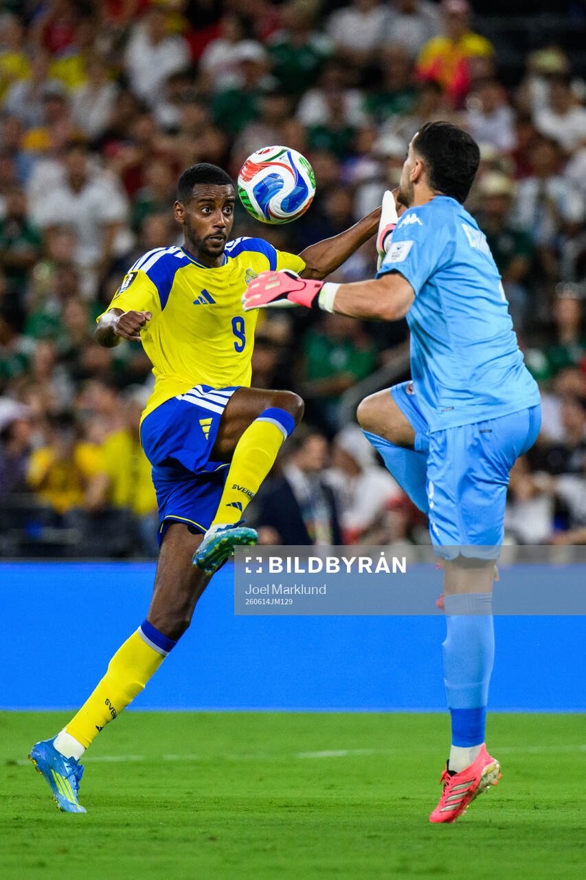 Alexander Isak of Sweden and goalkeeper Mouhib Chamakh of
