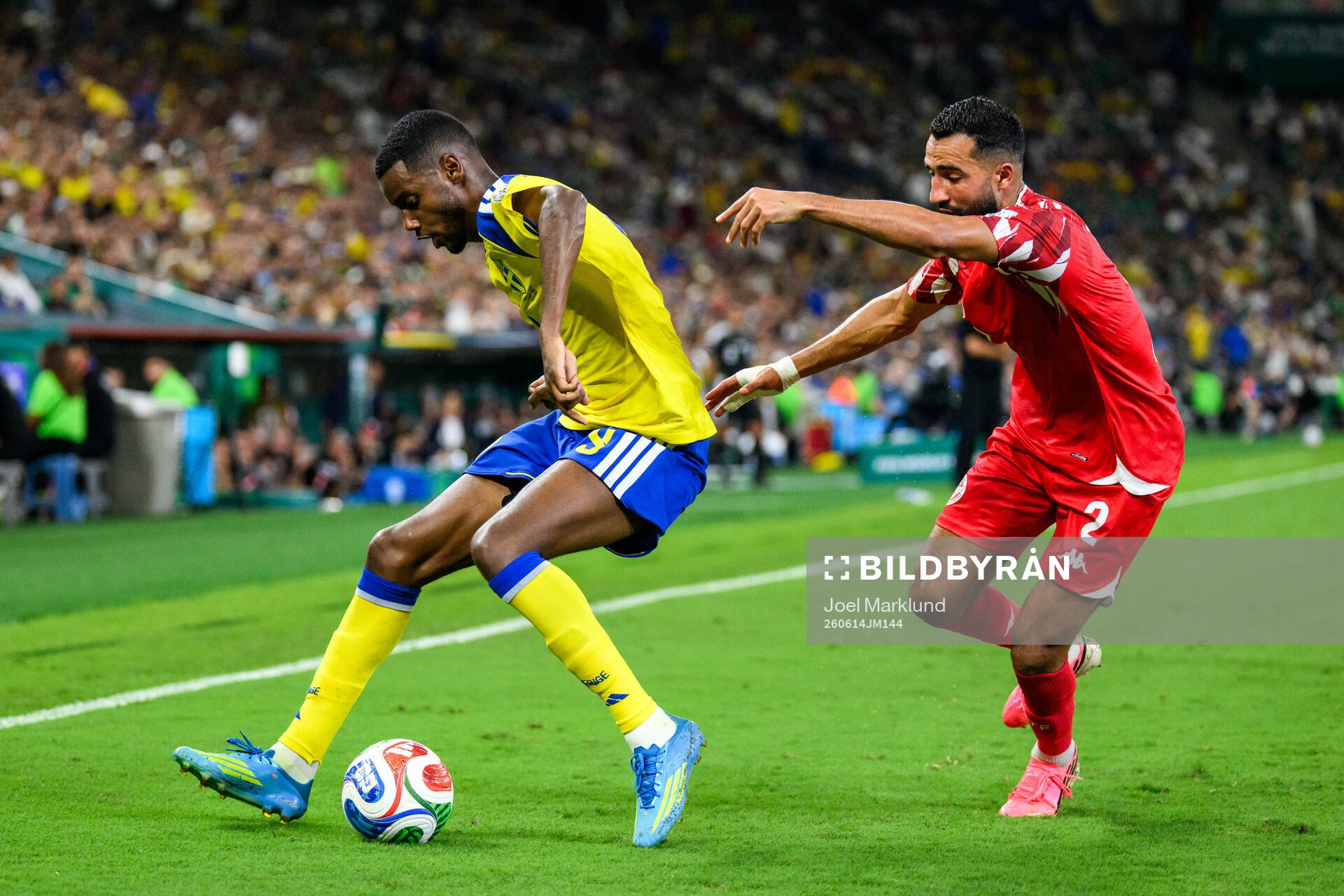 Alexander Isak of Sweden and Ali Abdi of Tunisia