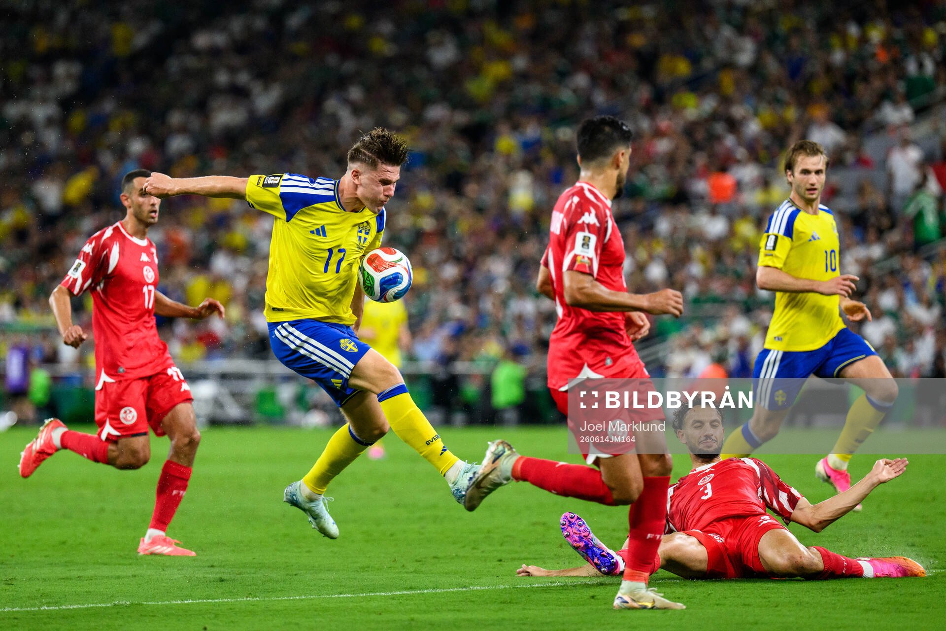 Viktor Gyökeres of Sweden against Montassar Talbi of