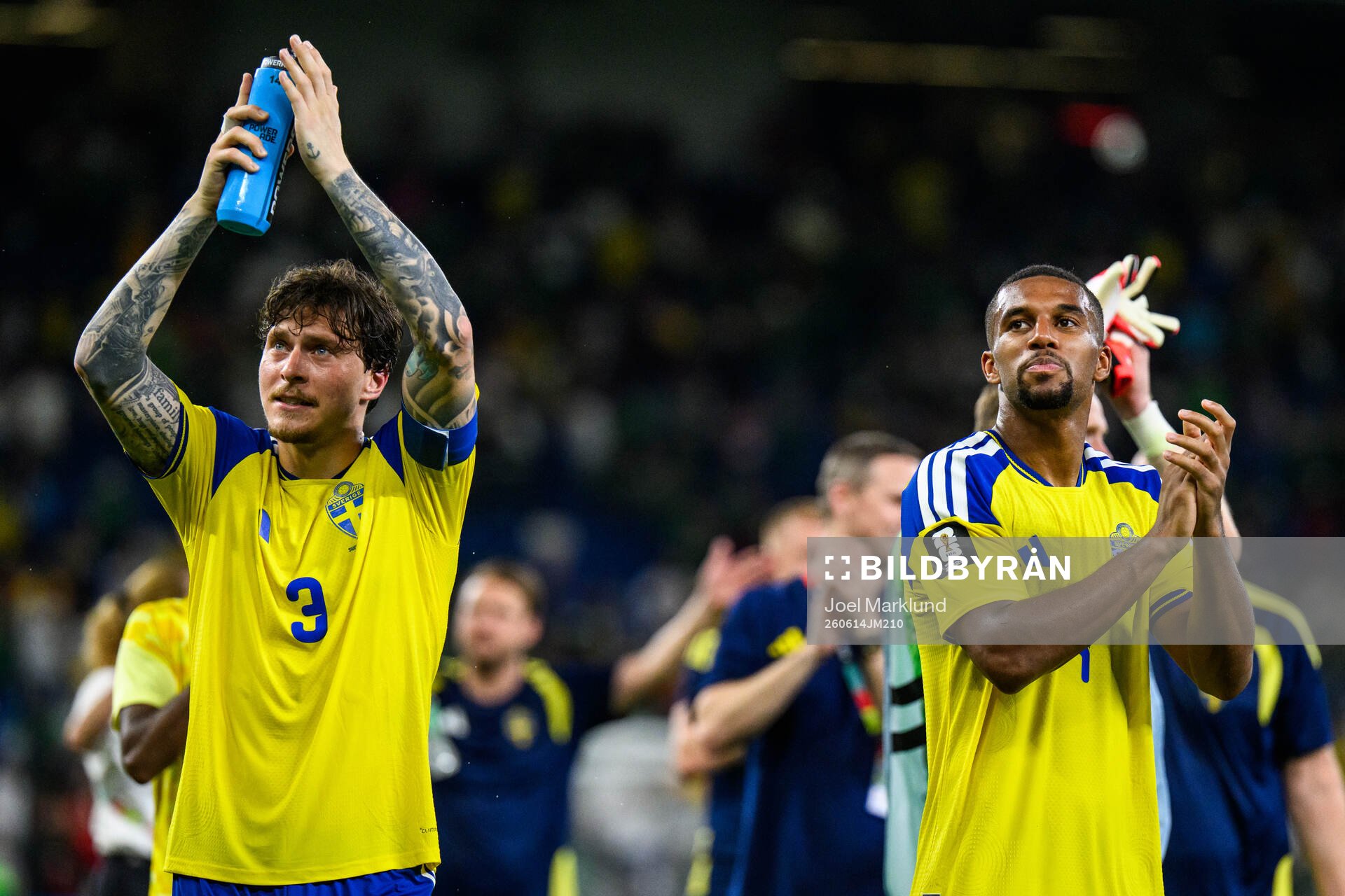 Victor Nilsson Lindelöf and Isak Hien of Sweden celebrate