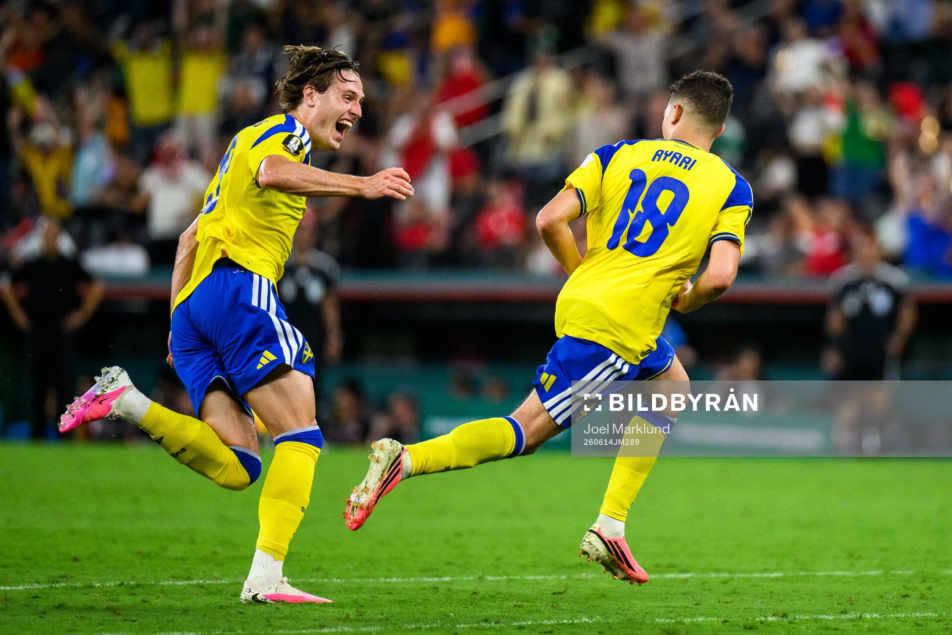 Mattias Svanberg and Yasin Ayari of Sweden celebrate