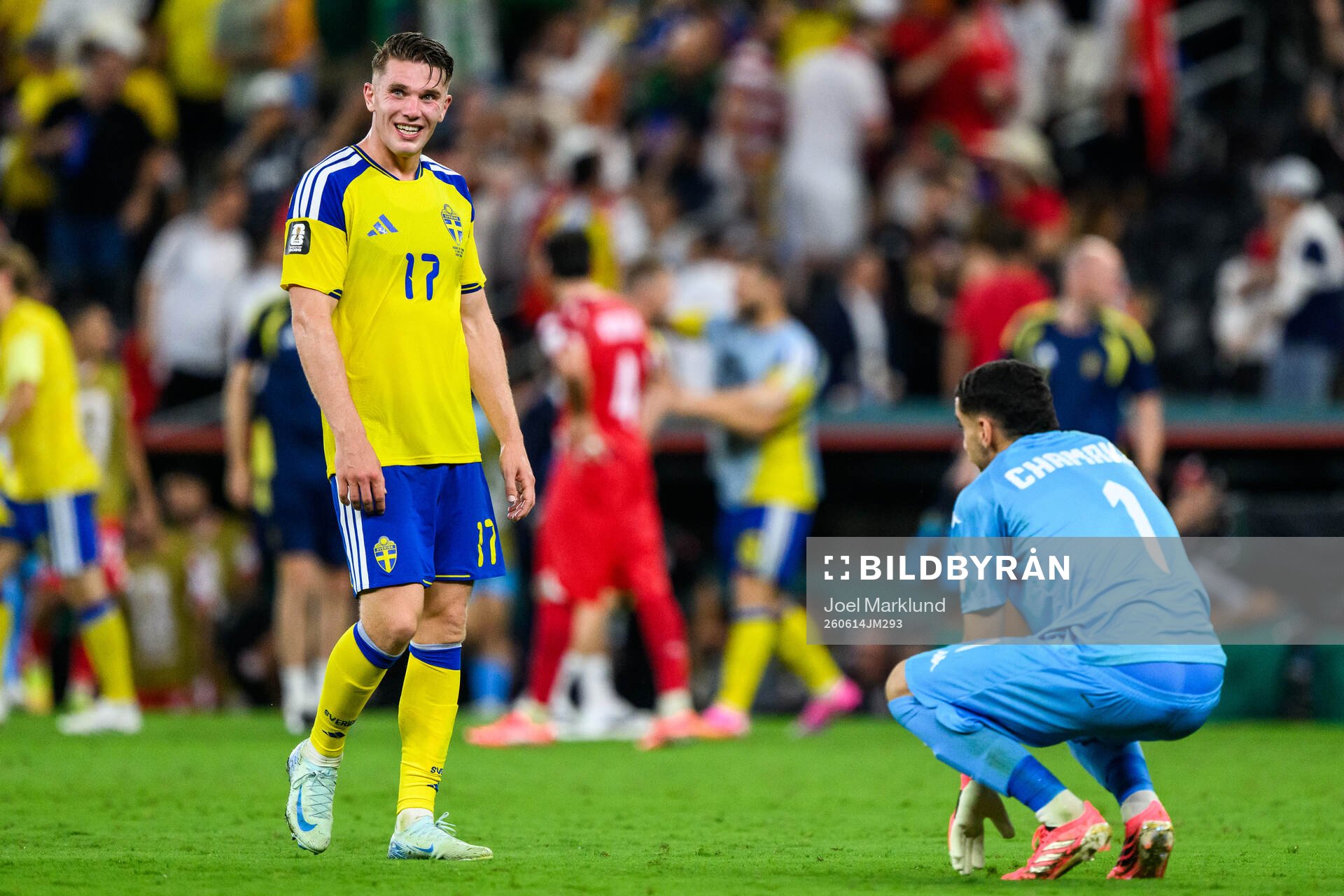 Viktor Gyökeres of Sweden and goalkeeper Mouhib Chamakh of