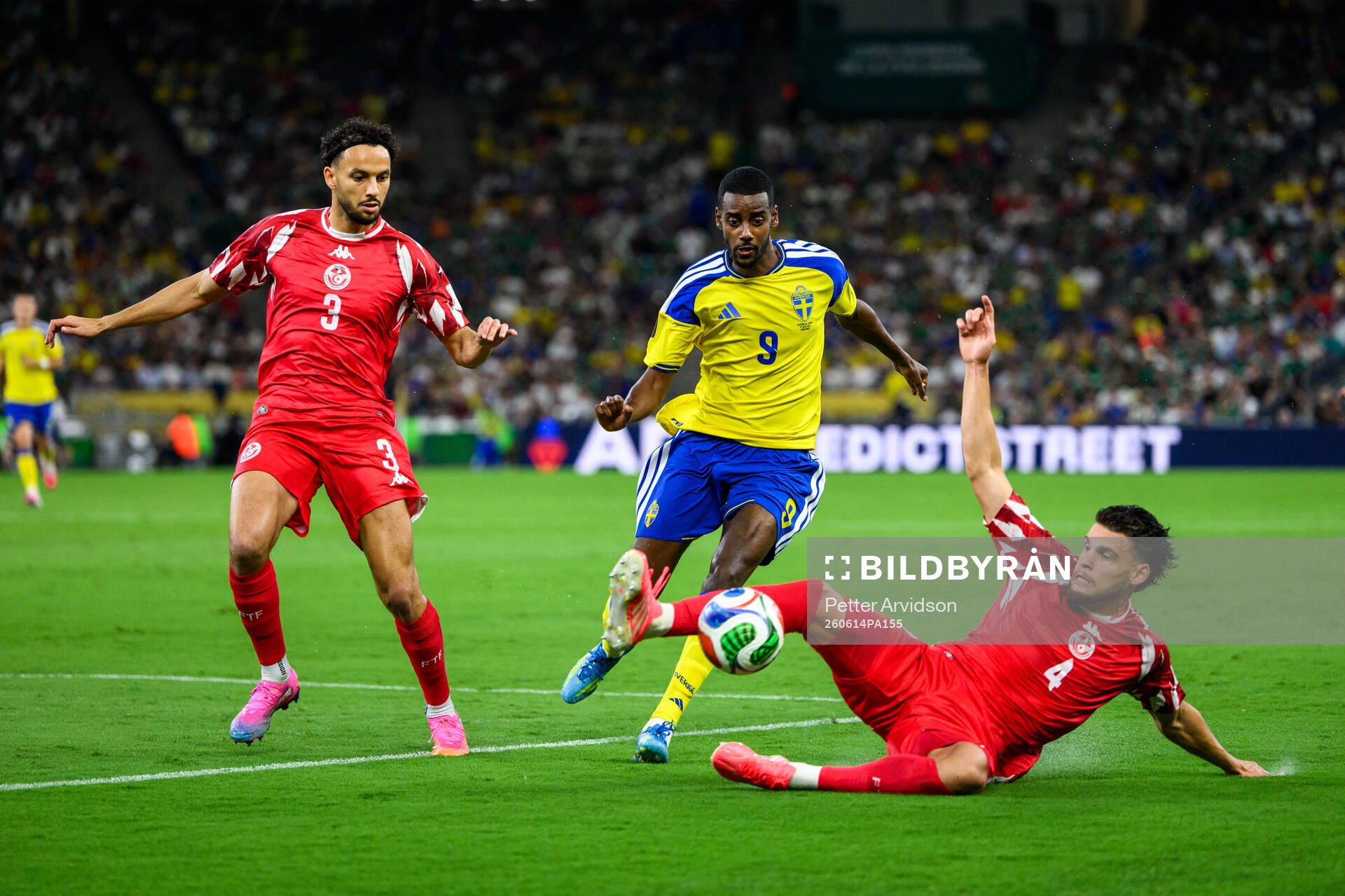 Alexander Isak of Sweden against Montassar Talbi and Omar