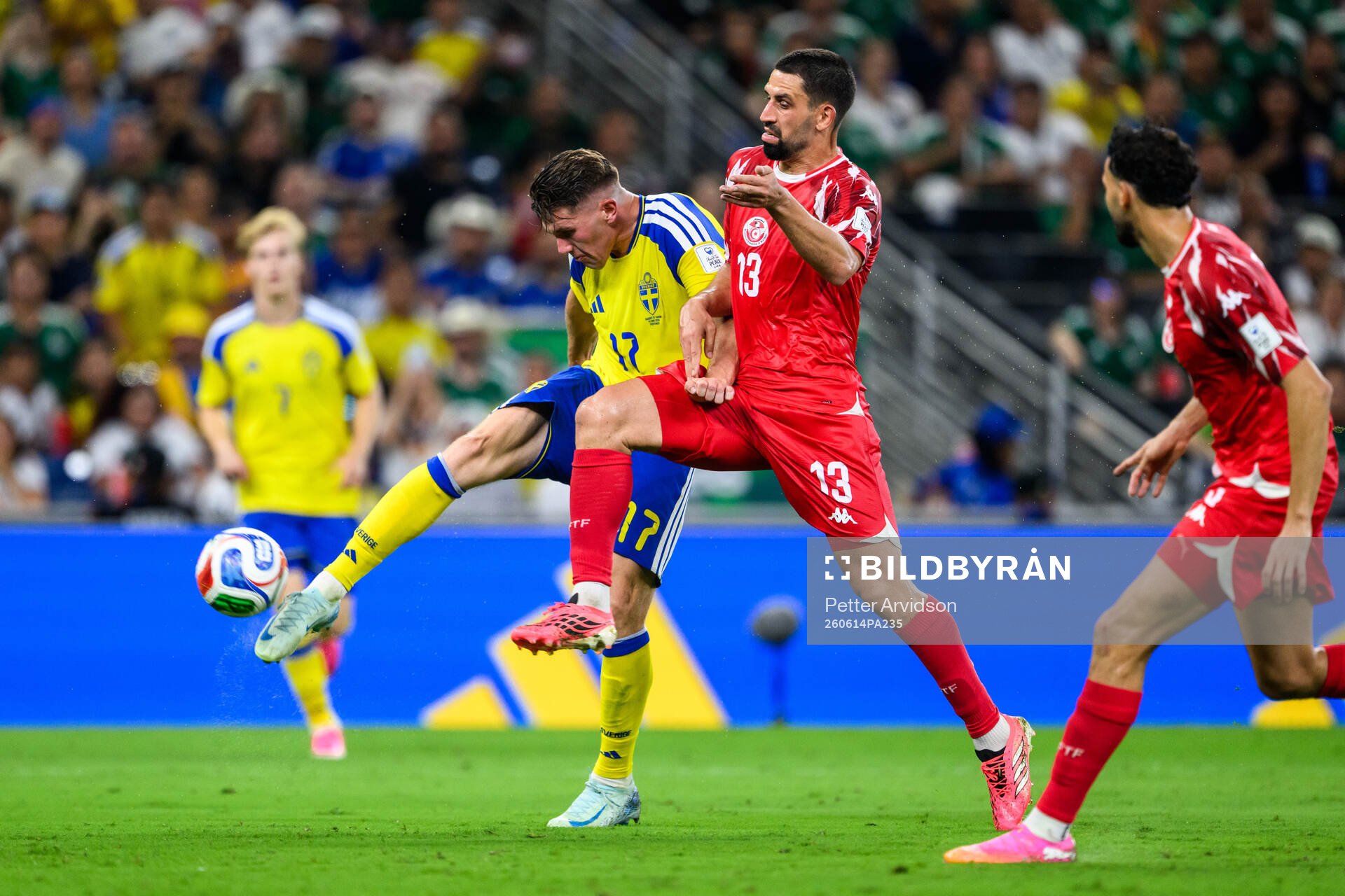 Viktor Gyökeres of Sweden and Rani Khedira of Tunisia