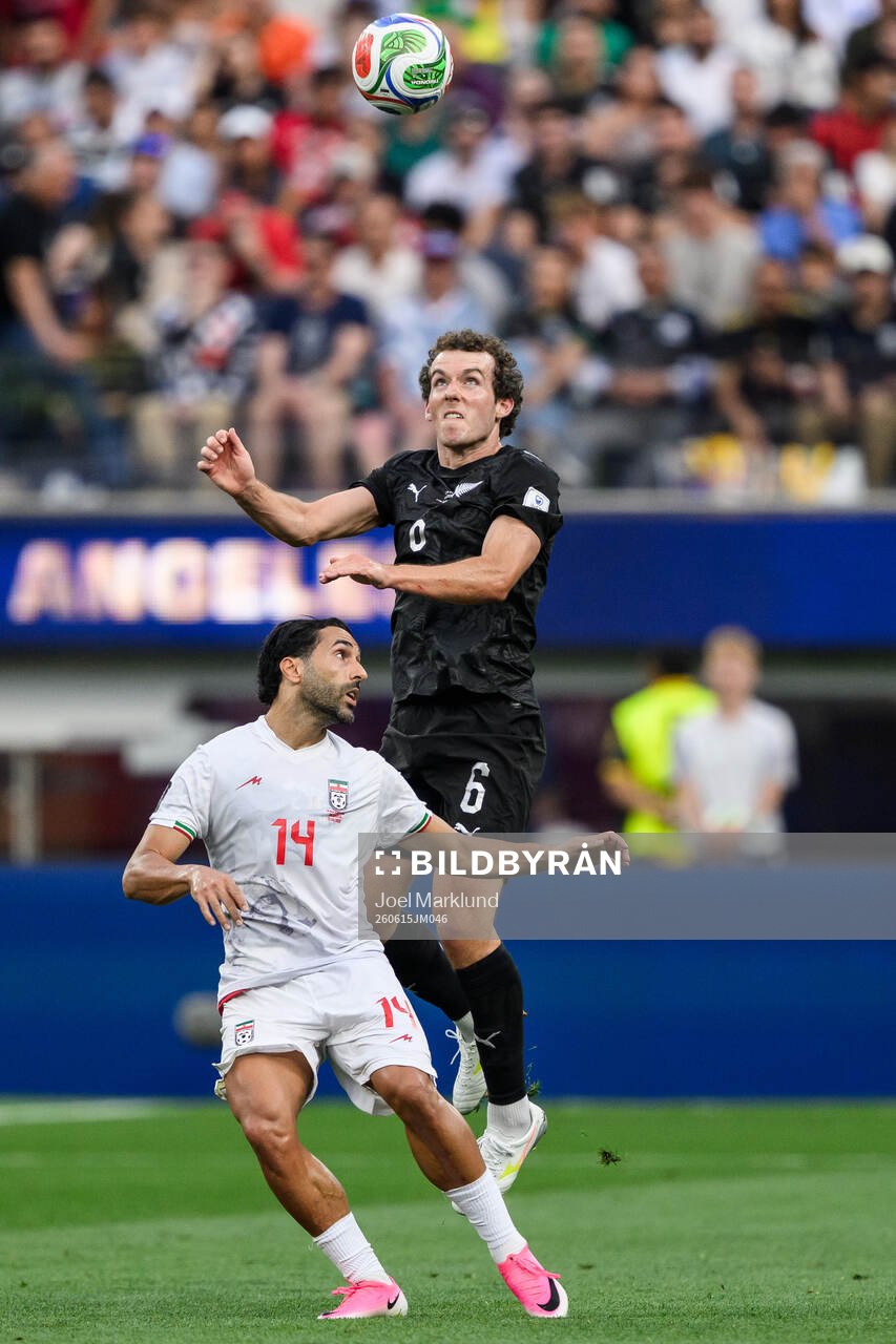 Saman Ghoddos of Iran and Joe Bell of New Zealand