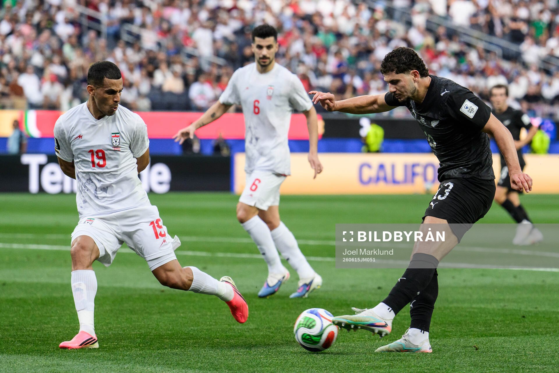 Ali Nemati of Iran and Liberato Cacace of New Zealand