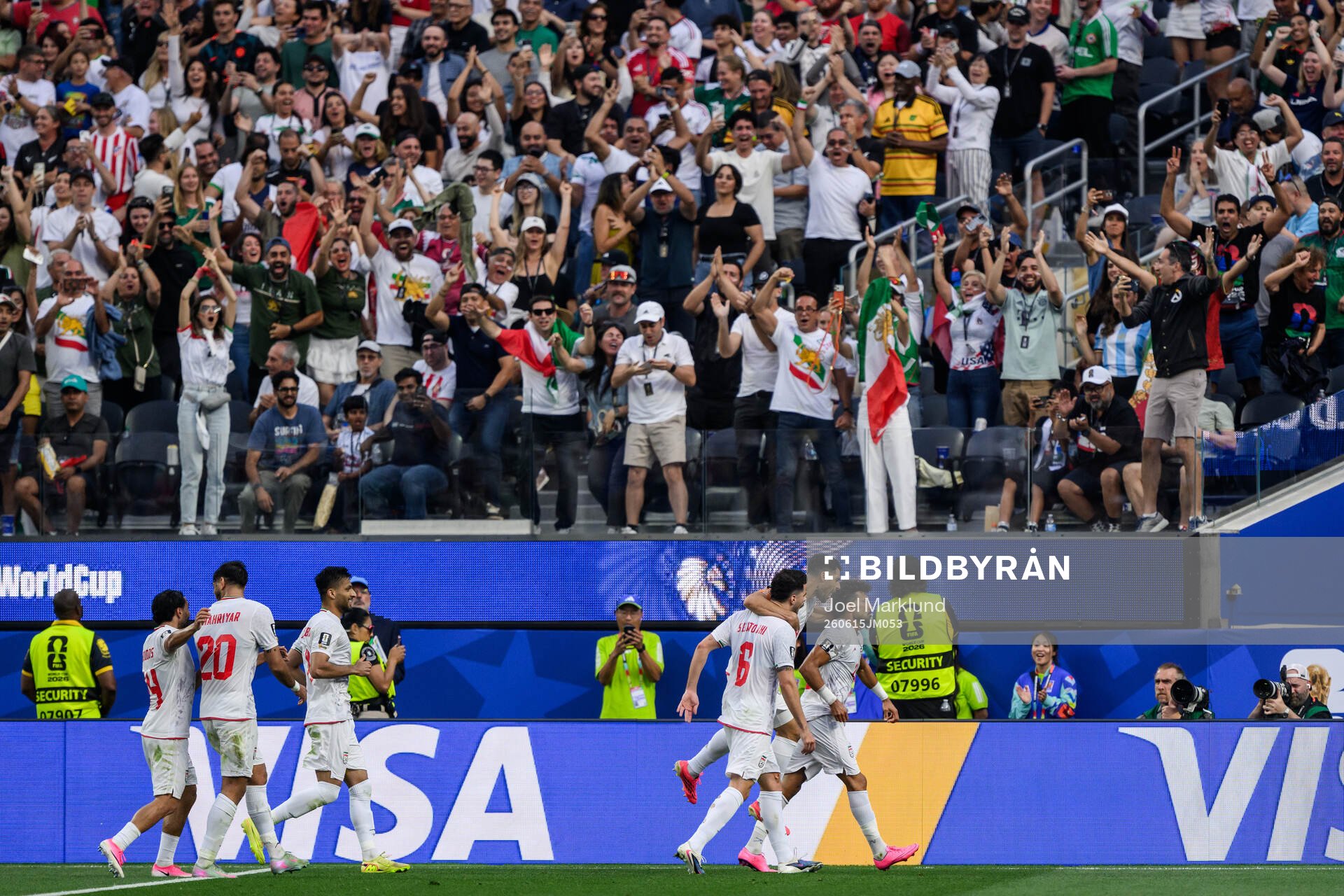 Ramin Rezaeian of Iran celebrate with teammates