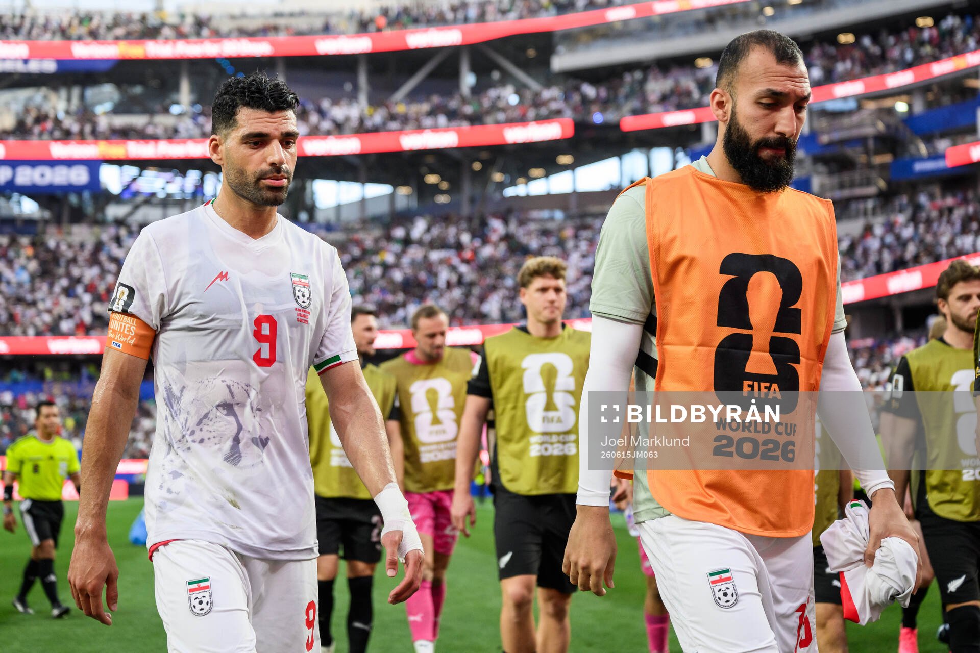 Mehdi Taremi and Ali Nemati of Iran in half time