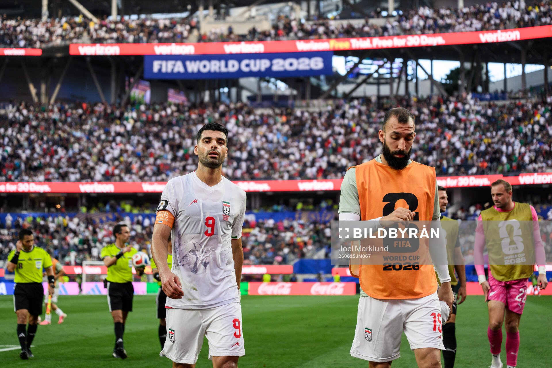 Mehdi Taremi and Ali Nemati of Iran in half time