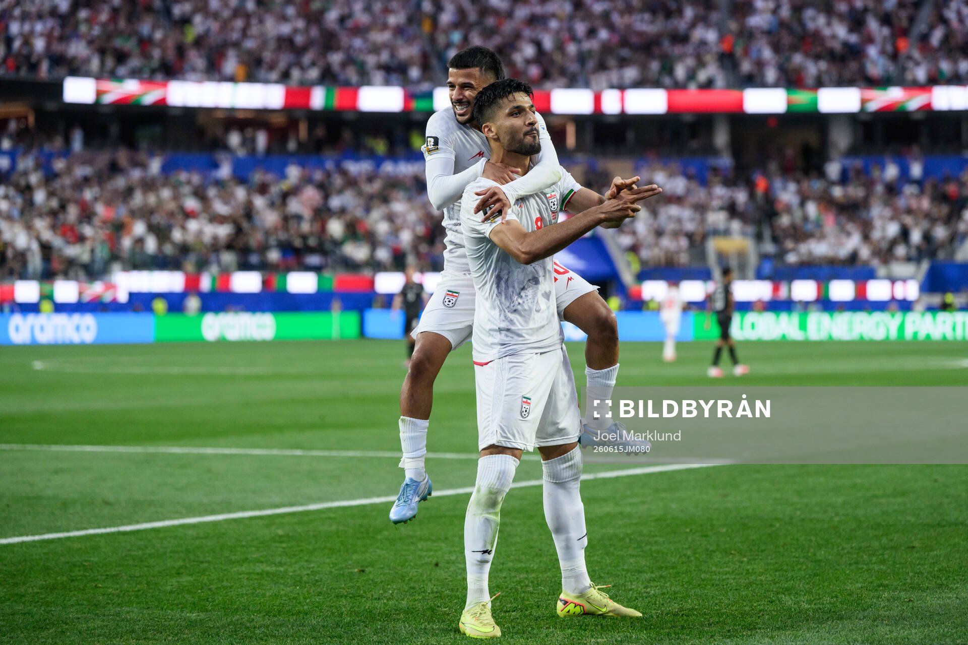 Mehdi Ghayedi and Mohammad Mohebbi of Iran celebrate
