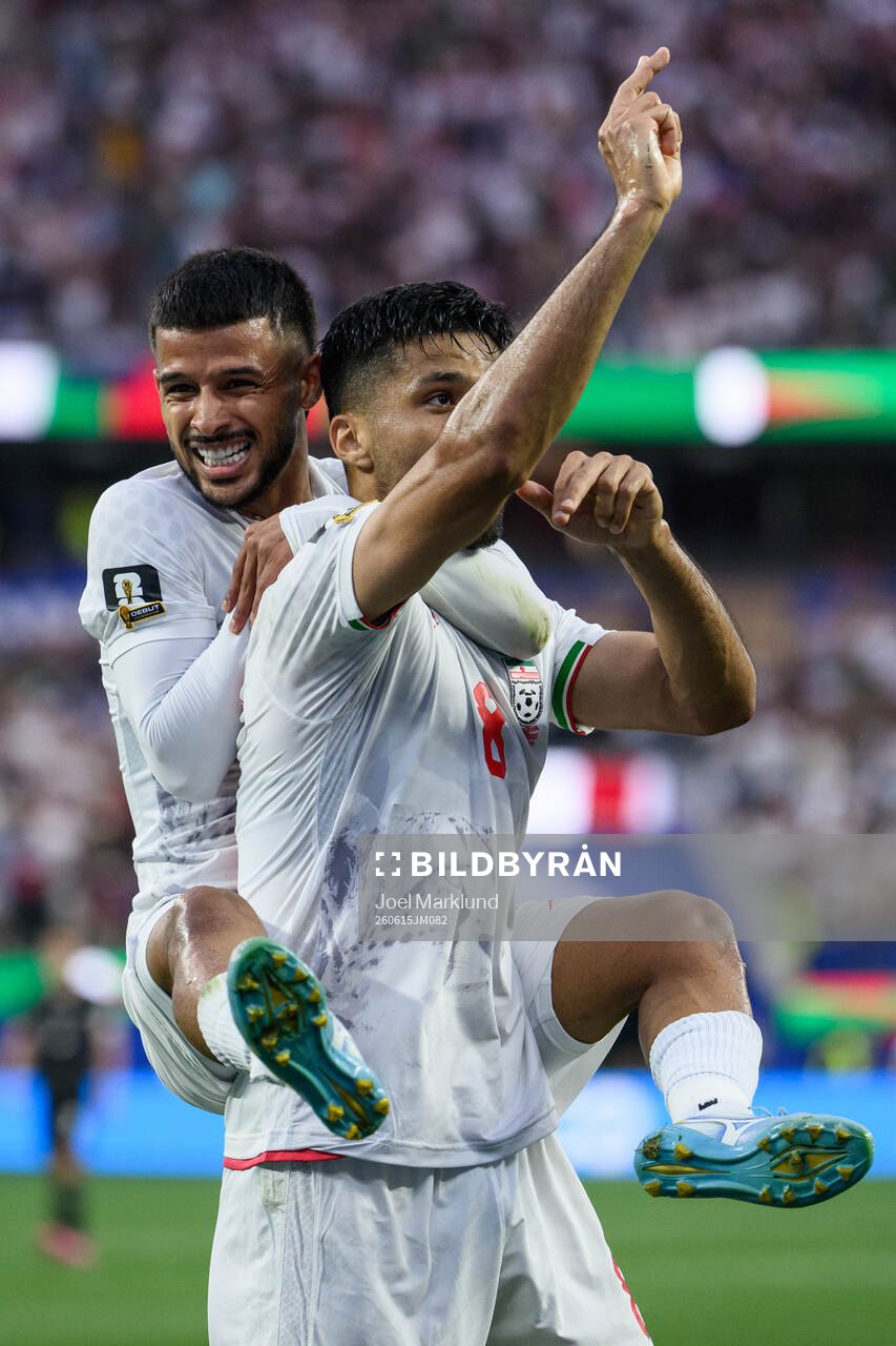 Mehdi Ghayedi and Mohammad Mohebbi of Iran celebrate