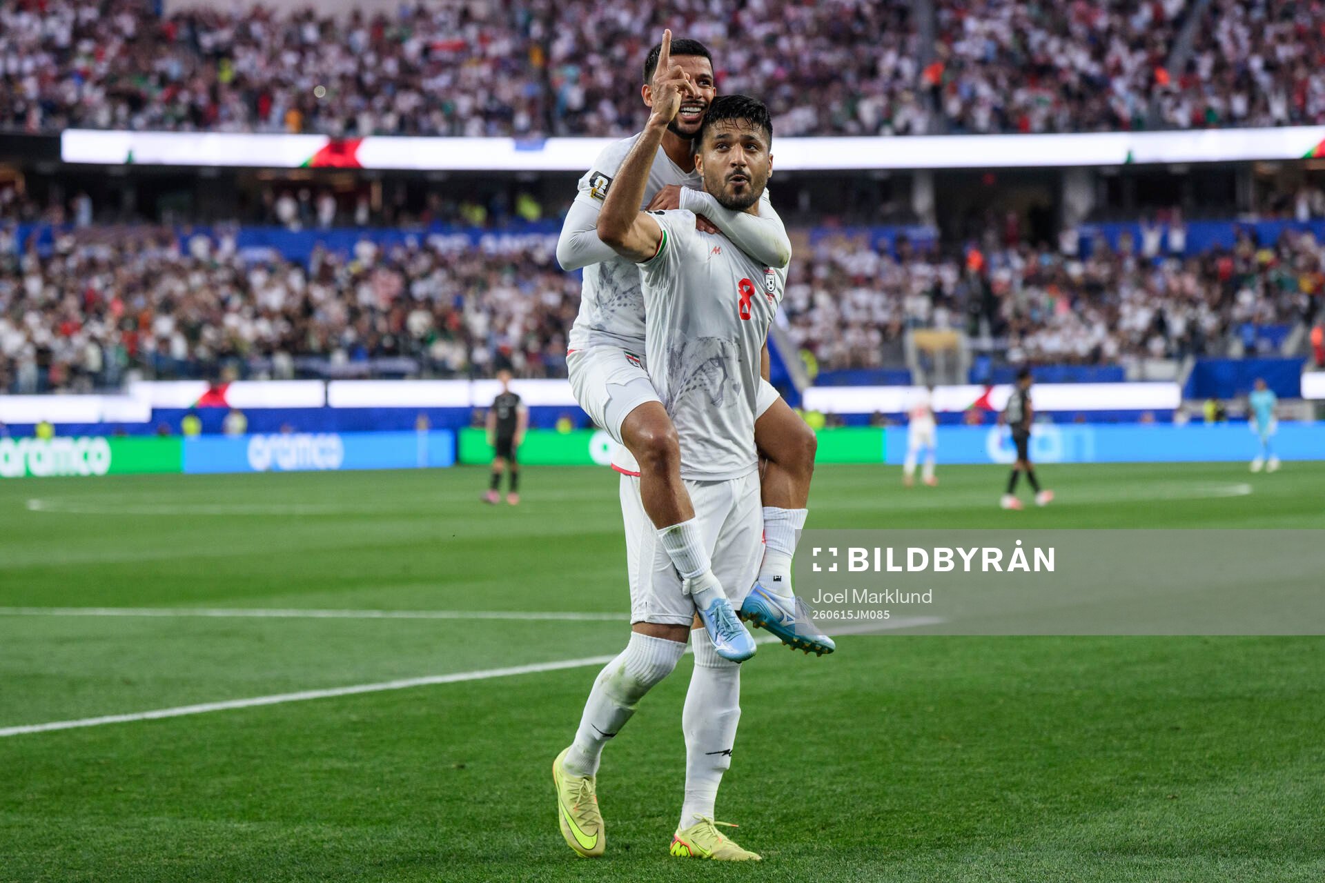 Mehdi Ghayedi and Mohammad Mohebbi of Iran celebrate