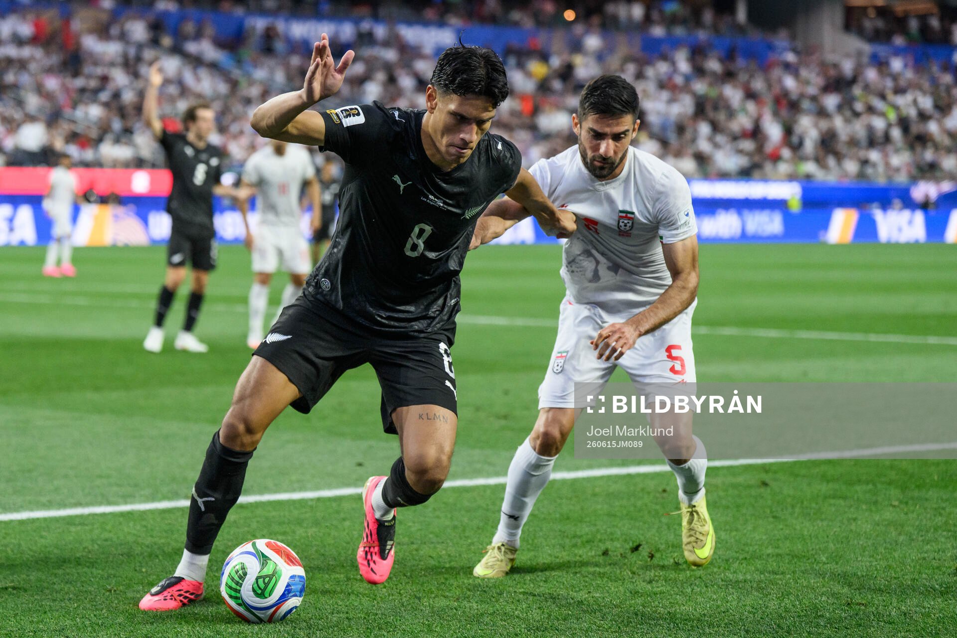 Marko Stamenic of New Zealand and Milad Mohammadi of Iran