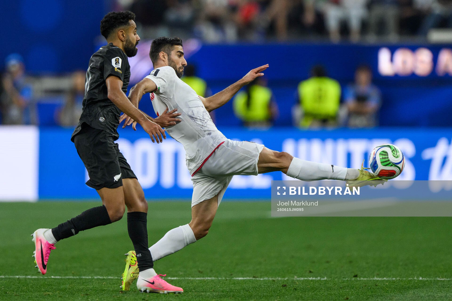 Sarpreet Singh of New Zealand and Milad Mohammadi of Iran