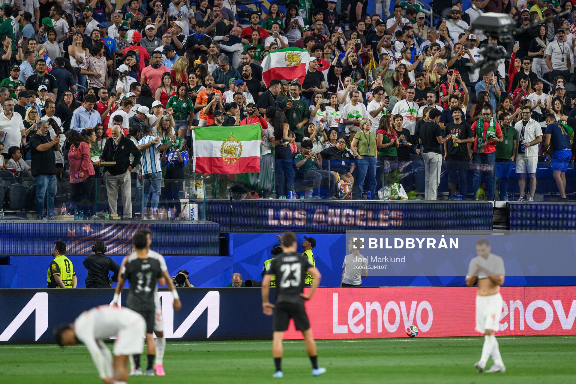 Fans with flags of Iran