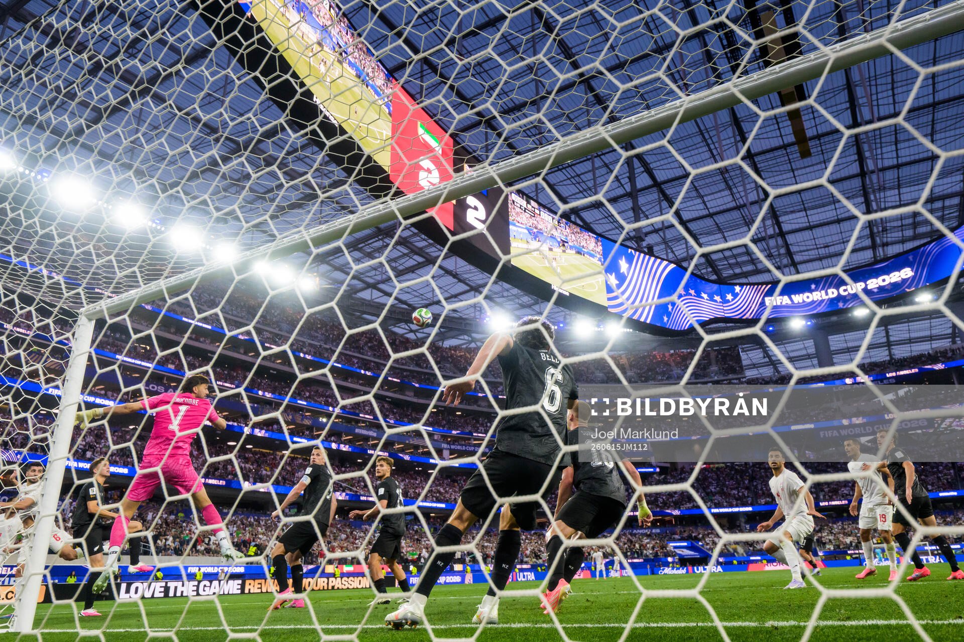 Goalkeeper Max Crocombe of New Zealand misses the ball