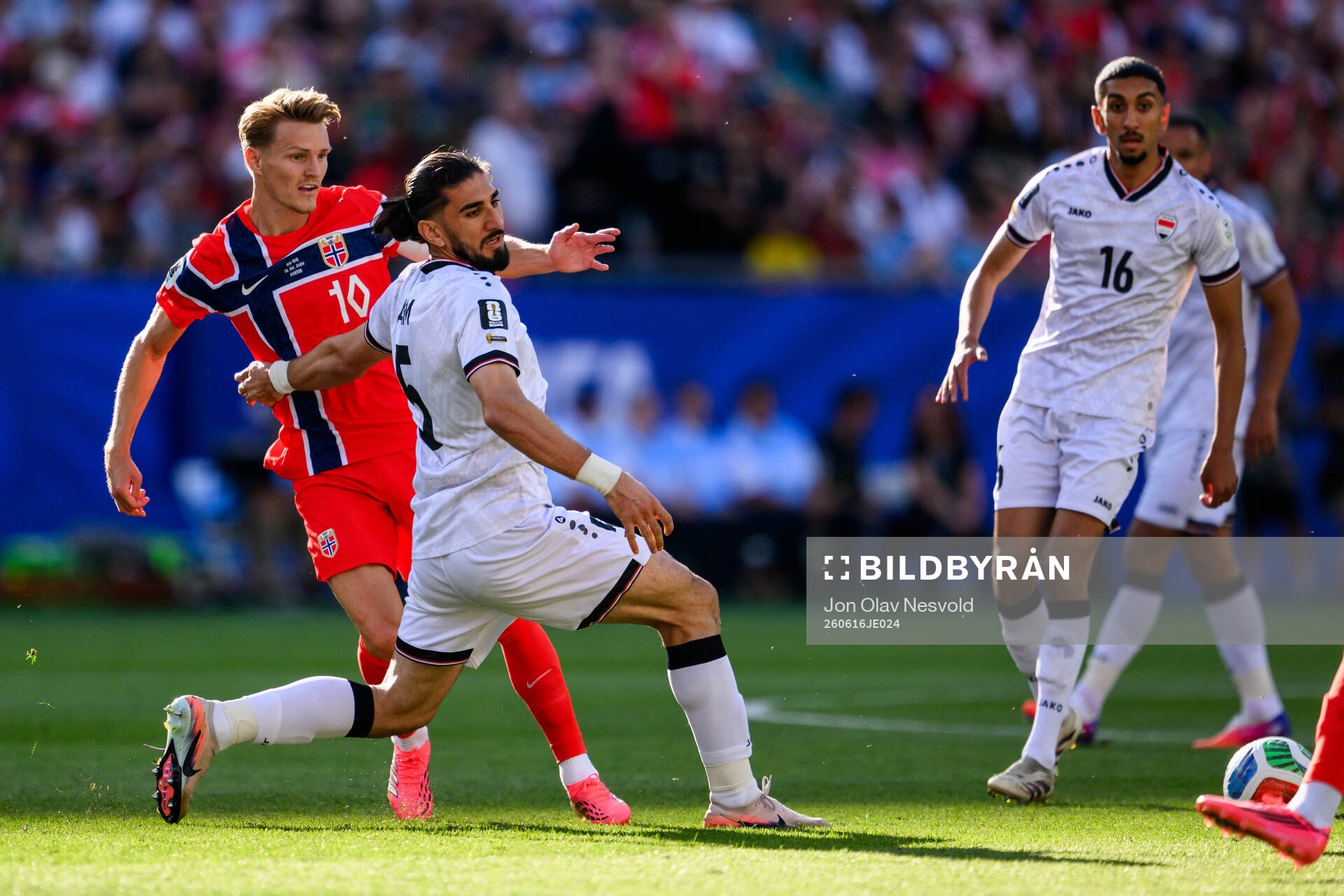 Martin Ødegaard of Norway and Akam Hashim Rahman of Iraq
