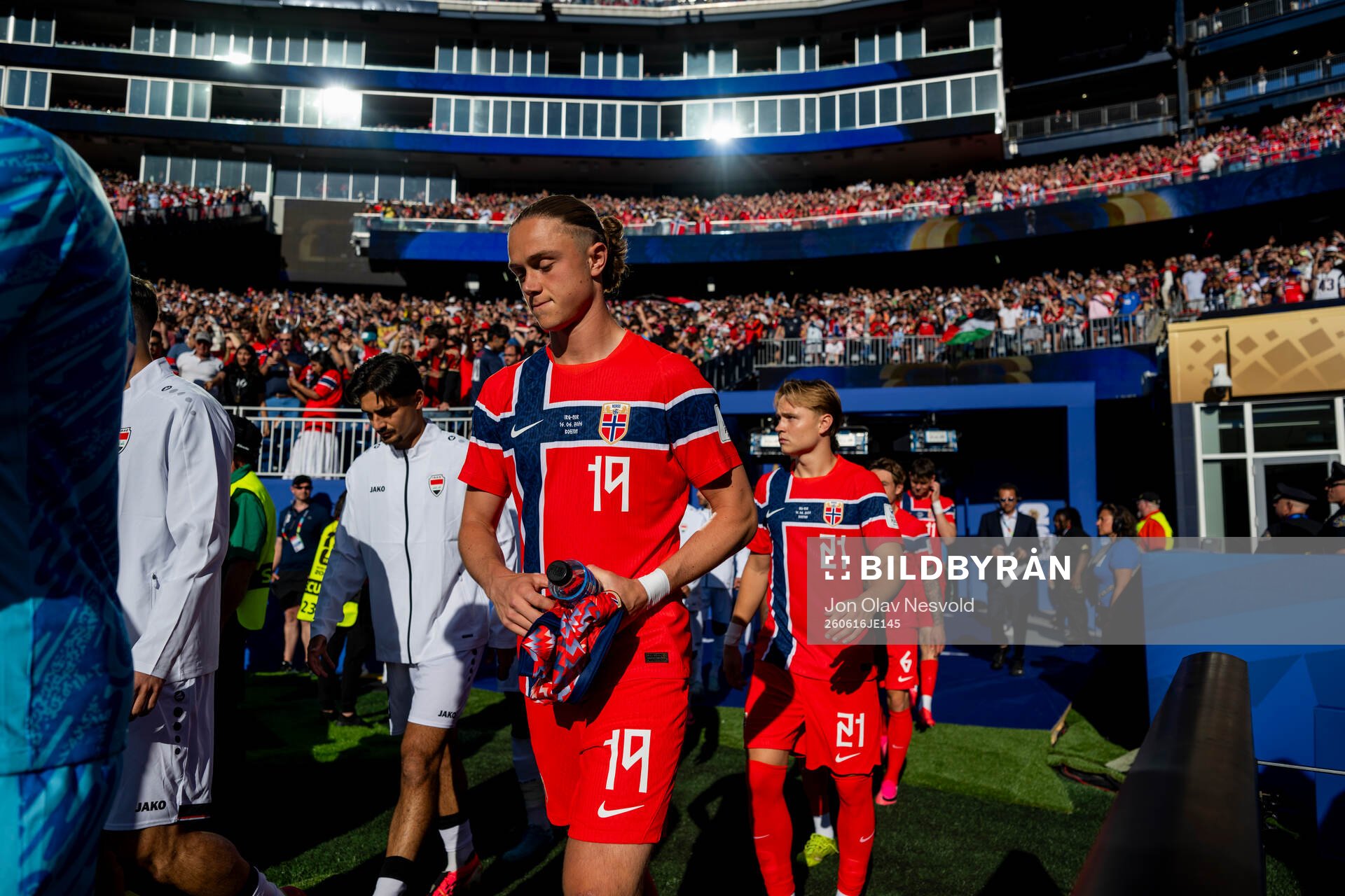 Thelo Aasgaard and Andreas Schjelderup of Norway enter the
