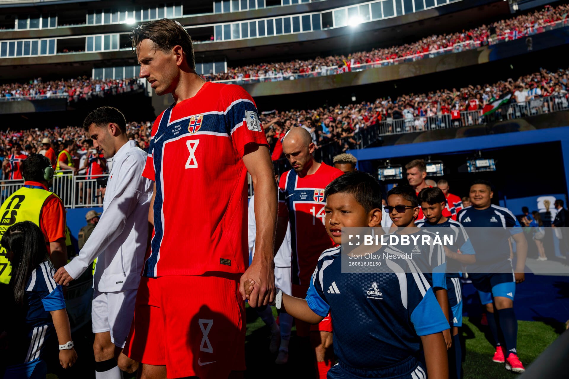 Sander Berge and Fredrik Aursnes of Norway enter the pitch