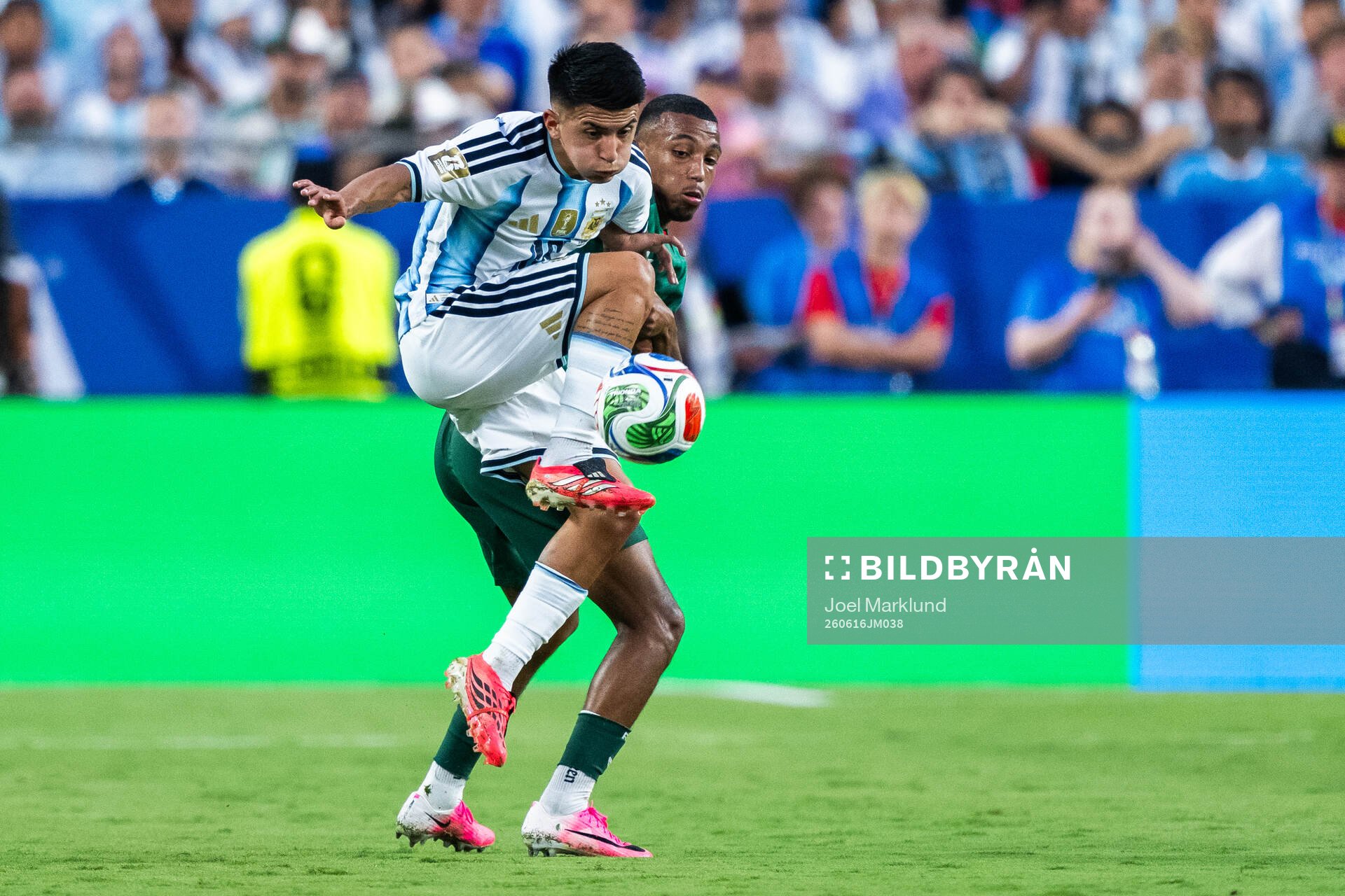Thiago Almada and Rafik Belghali of Algeria