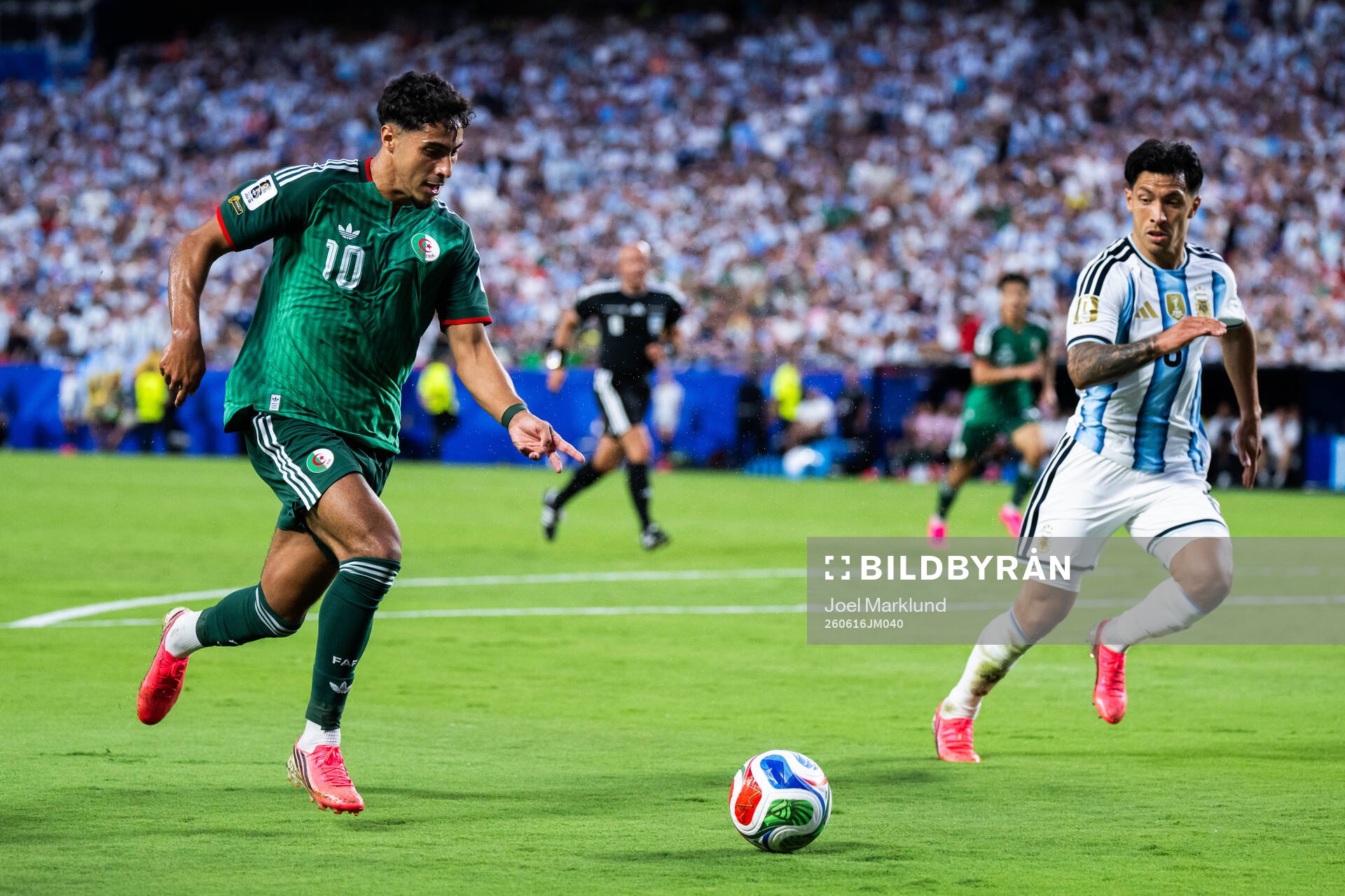 Fares Chaibi of Algeria and Thiago Almada of Argentina