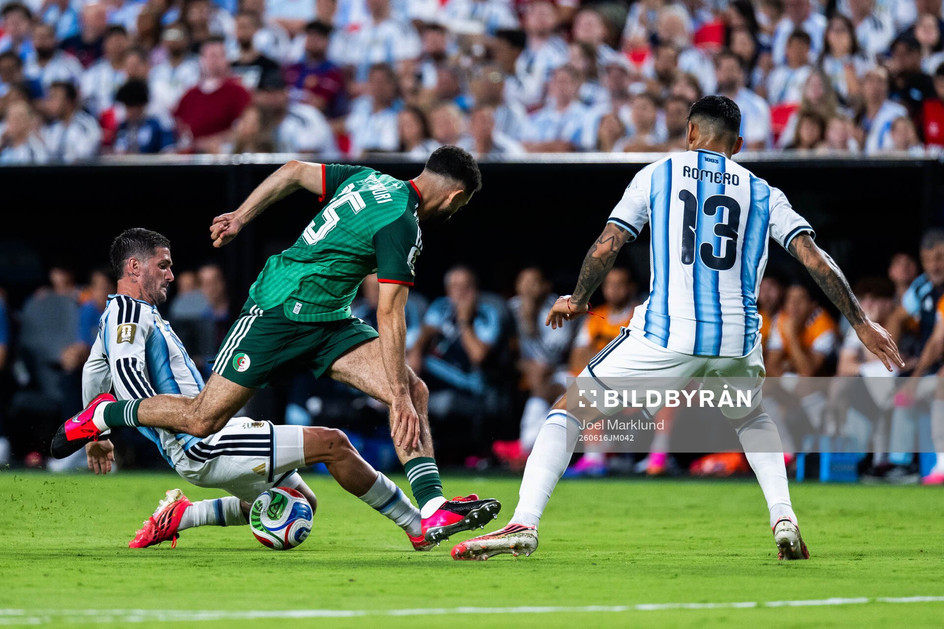 Rodrigo De Paul and Cristian Romero of Argentina as well as