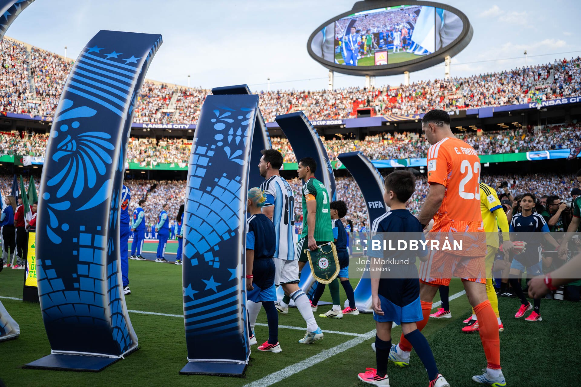 Lionel Messi and goalkeeper Emiliano Martinez of Argentina