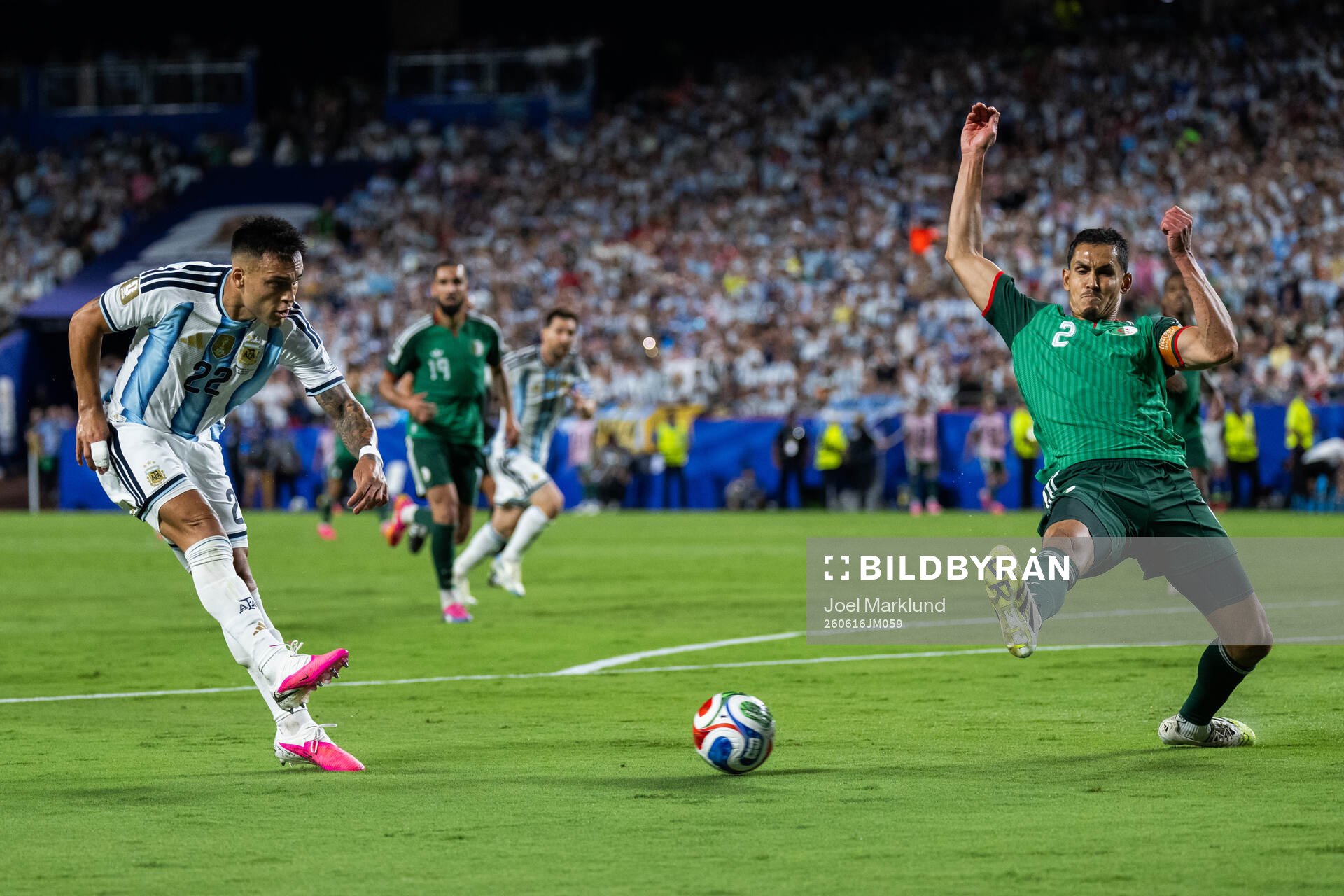 Lautaro Martinez of Argentina and Aissa Mandi of Algeria