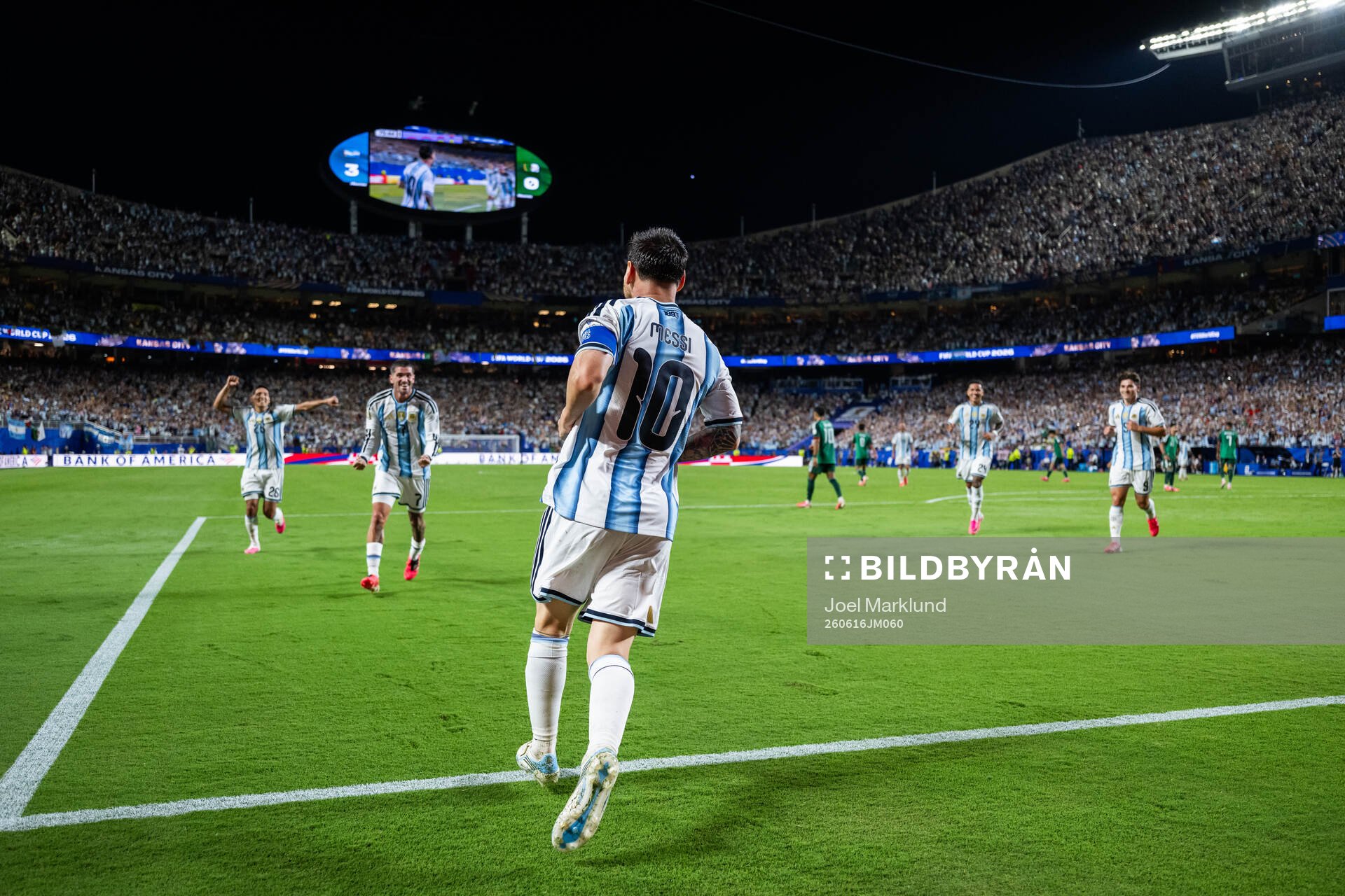 Lionel Messi of Argentina celebrates with teammates
