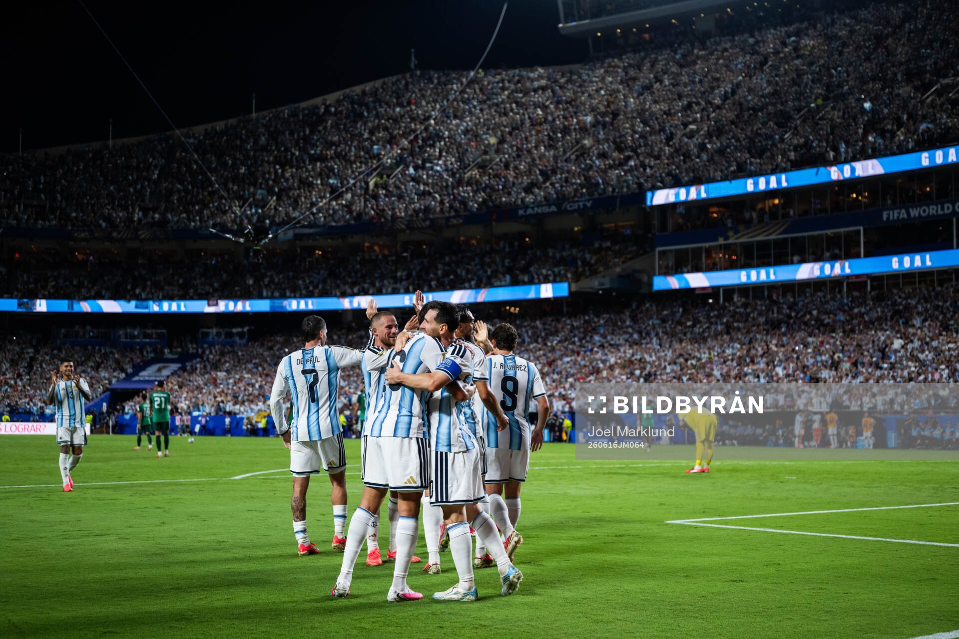 Lionel Messi of Argentina celebrates with teammates