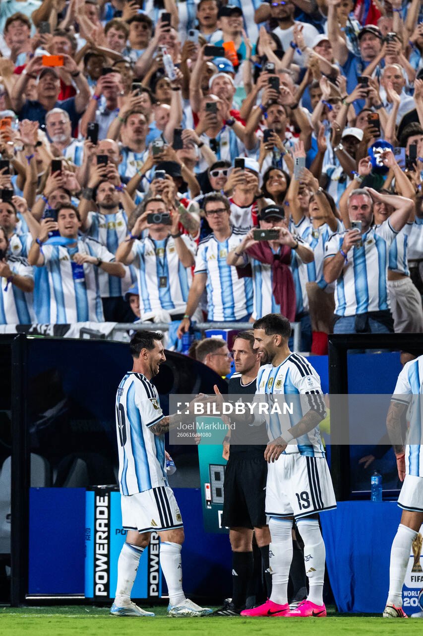 Lionel Messi and Nicolas Otamendi of Argentina
