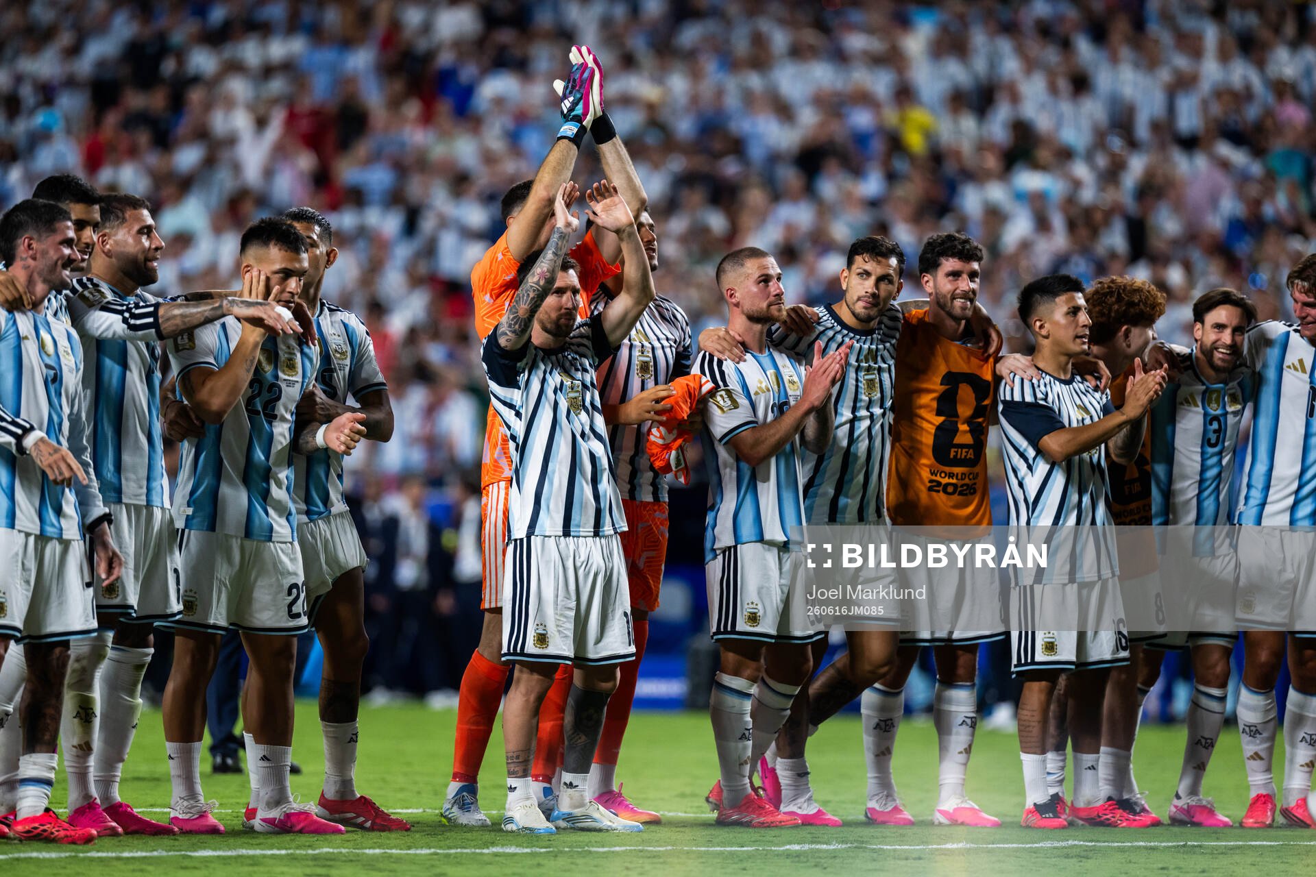 Lionel Messi of Argentina celebrates with teammates