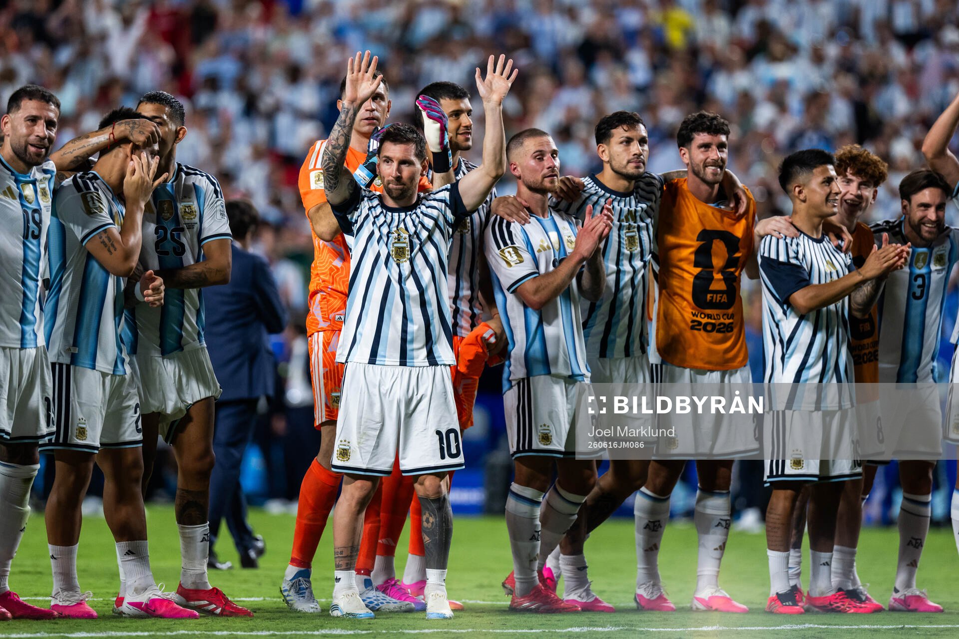 Lionel Messi of Argentina celebrates with teammates