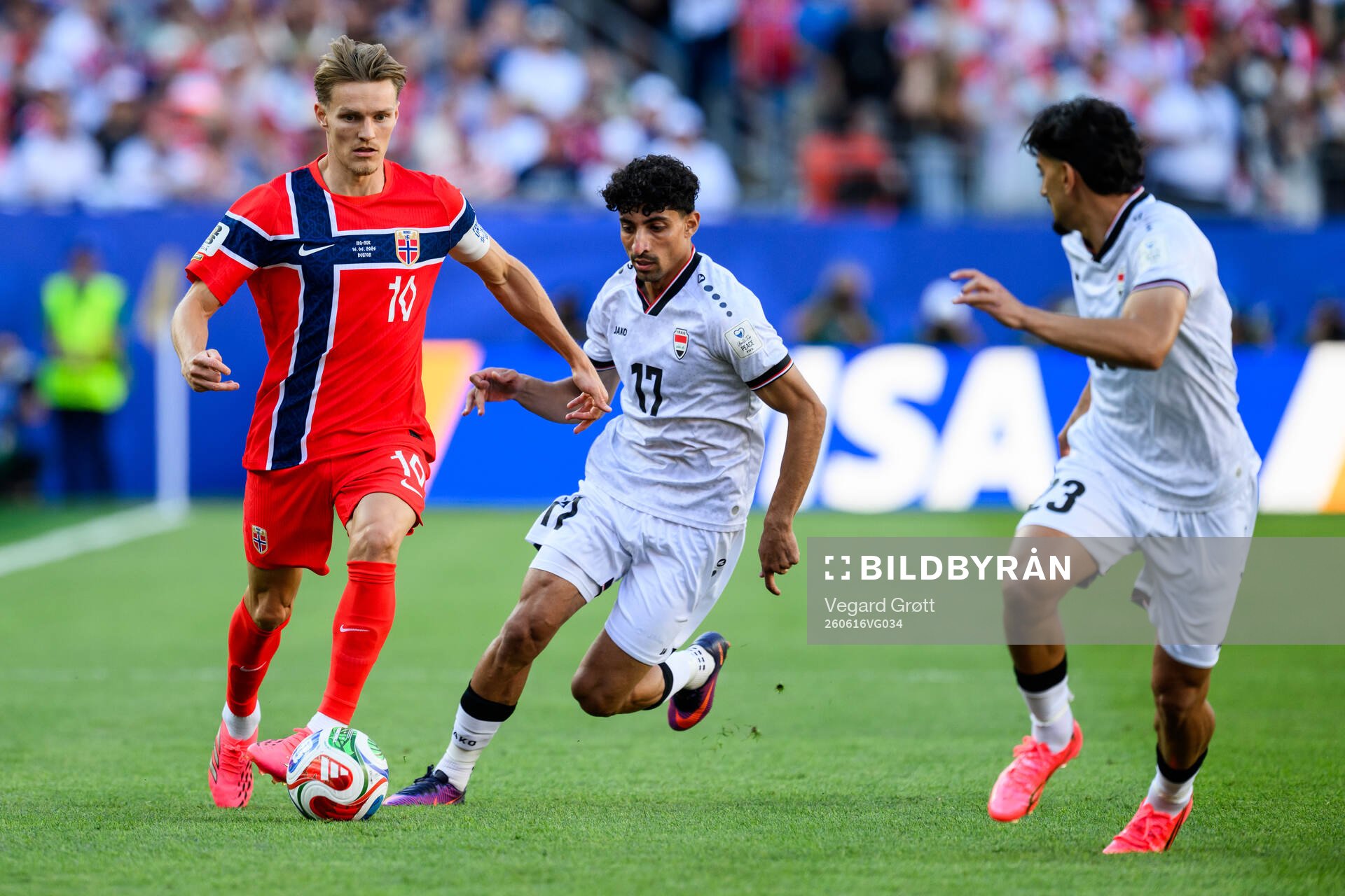 Martin Ødegaard of Norway and Ali Jasim Elaibi Al-Tameemi
