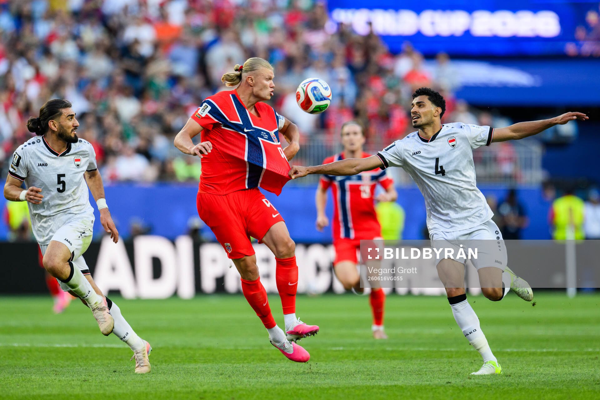 Erling Braut Haaland of Norway and Zaid Tahseen of Iraq