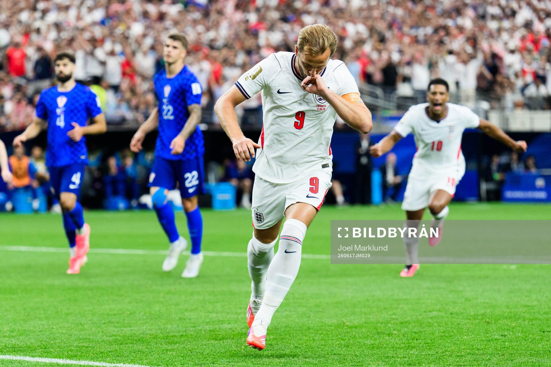 Harry Kane of England celebrates scoring 1-0