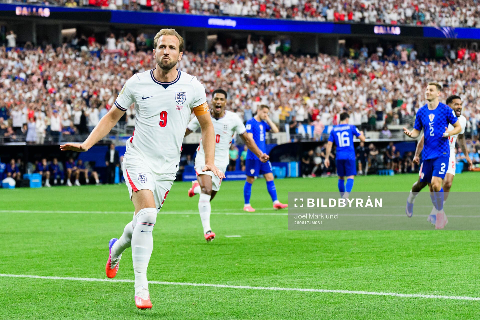 Harry Kane of England celebrates scoring 1-0