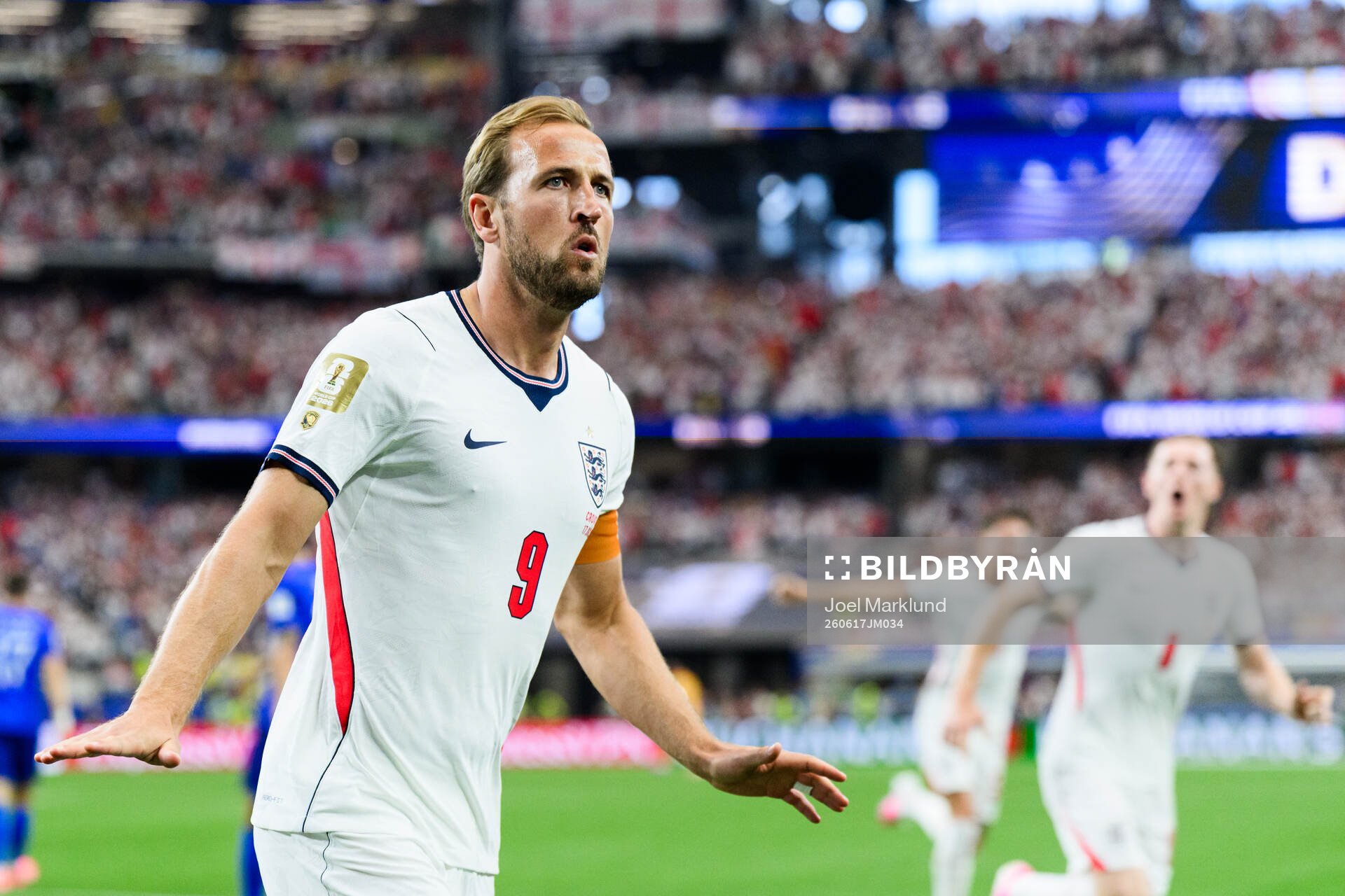 Harry Kane of England celebrates scoring 1-0