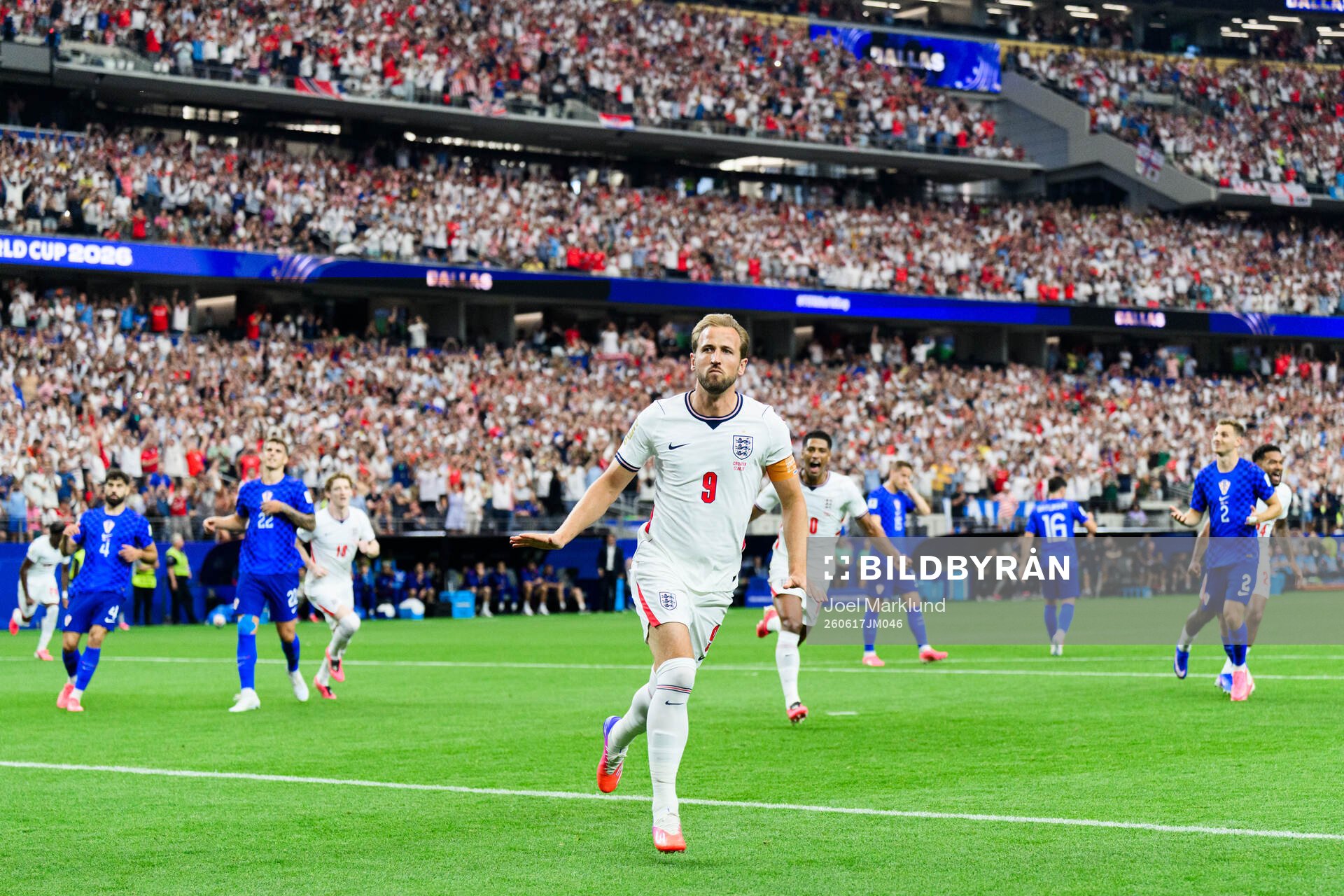 Harry Kane of England celebrates scoring 1-0