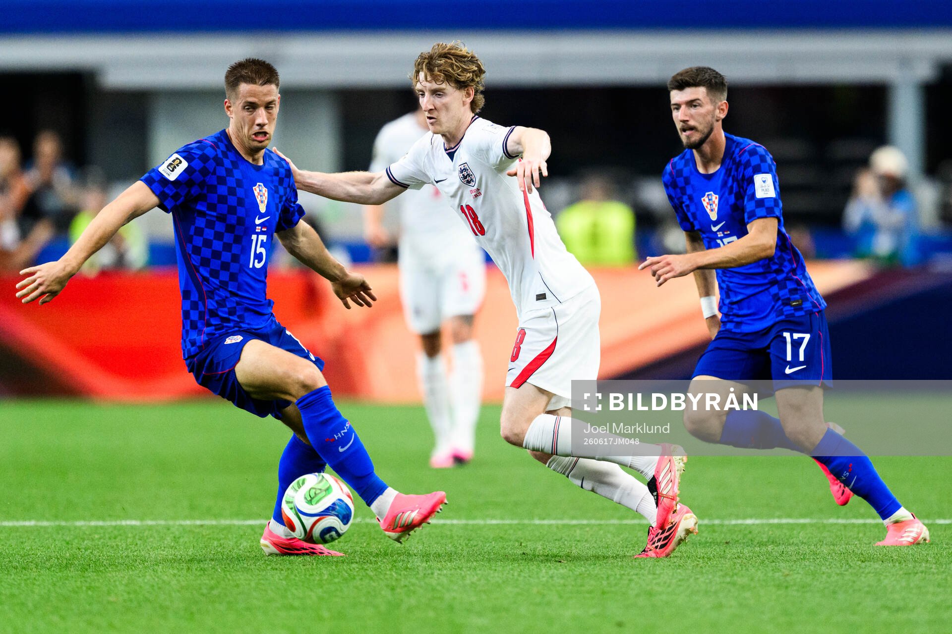 Mario Pasalic and Petar Sucic of Croatia and Anthony Gordon