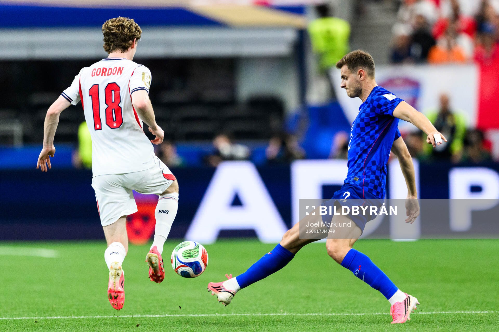 Anthony Gordon of England and Josip Stanisic of Croatia