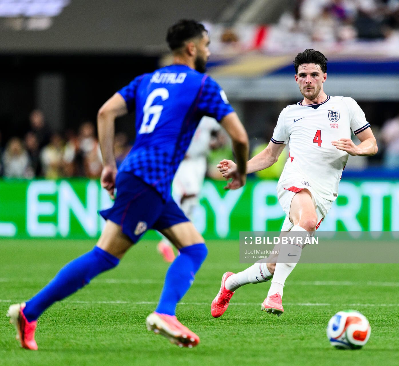 Josip Sutalo of Croatia and Declan Rice of England