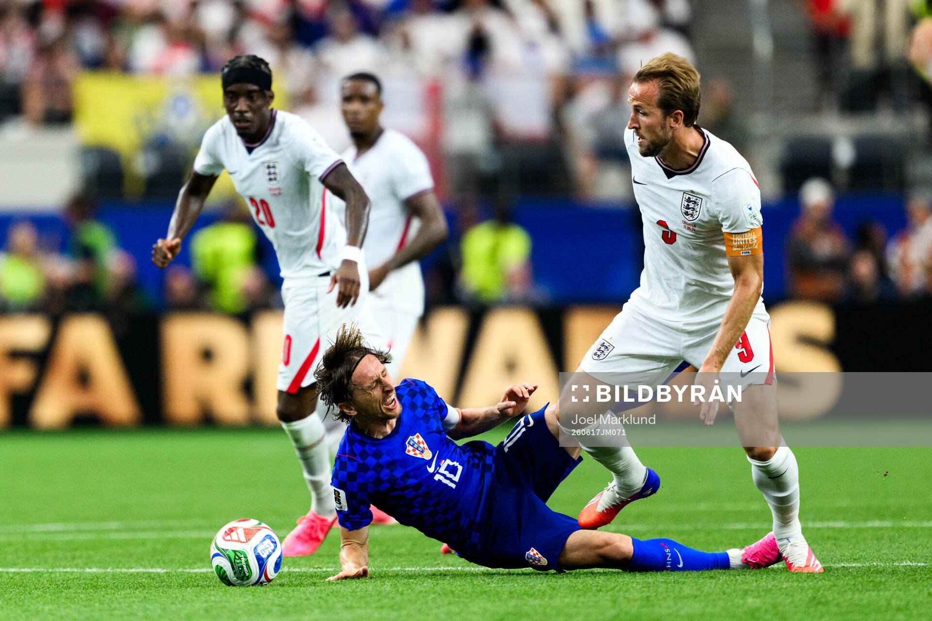 Luka Modric of Croatia and Harry Kane of England