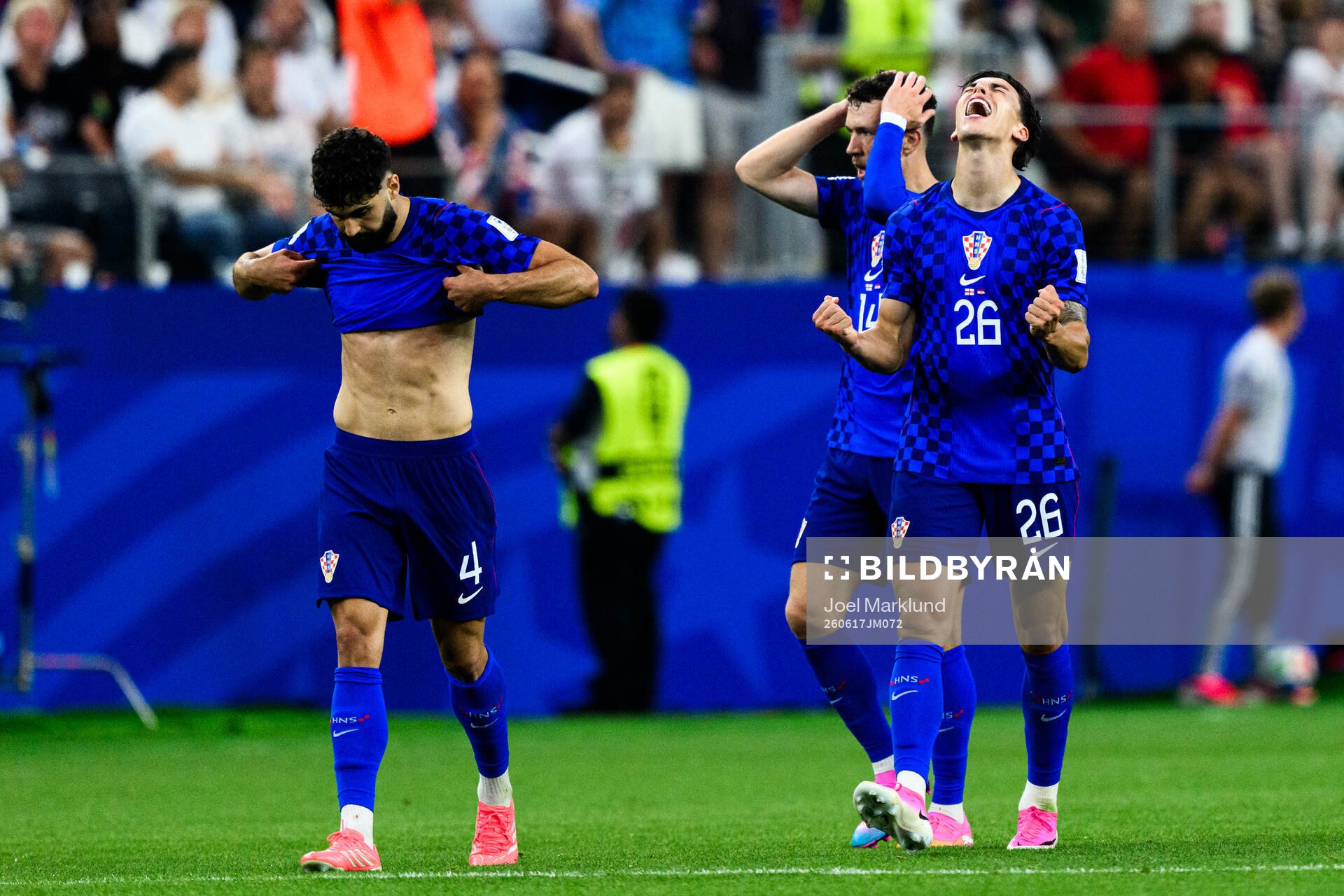 Petar Musa of Croatia celebrates scoring 2-2