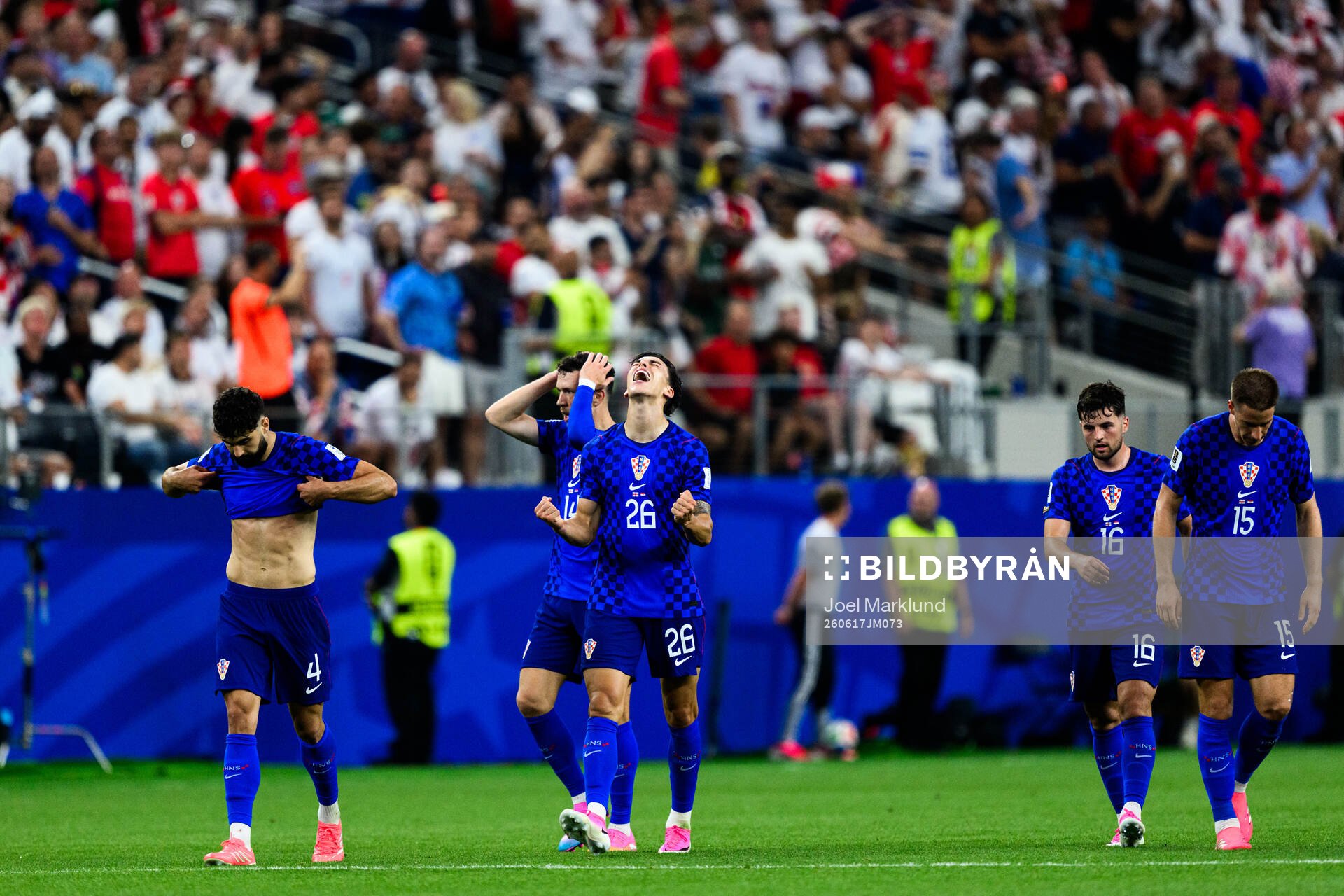 Petar Musa of Croatia celebrates scoring 2-2