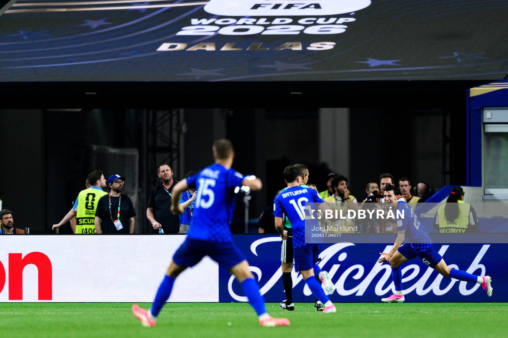 Petar Musa of Croatia celebrates scoring 2-2