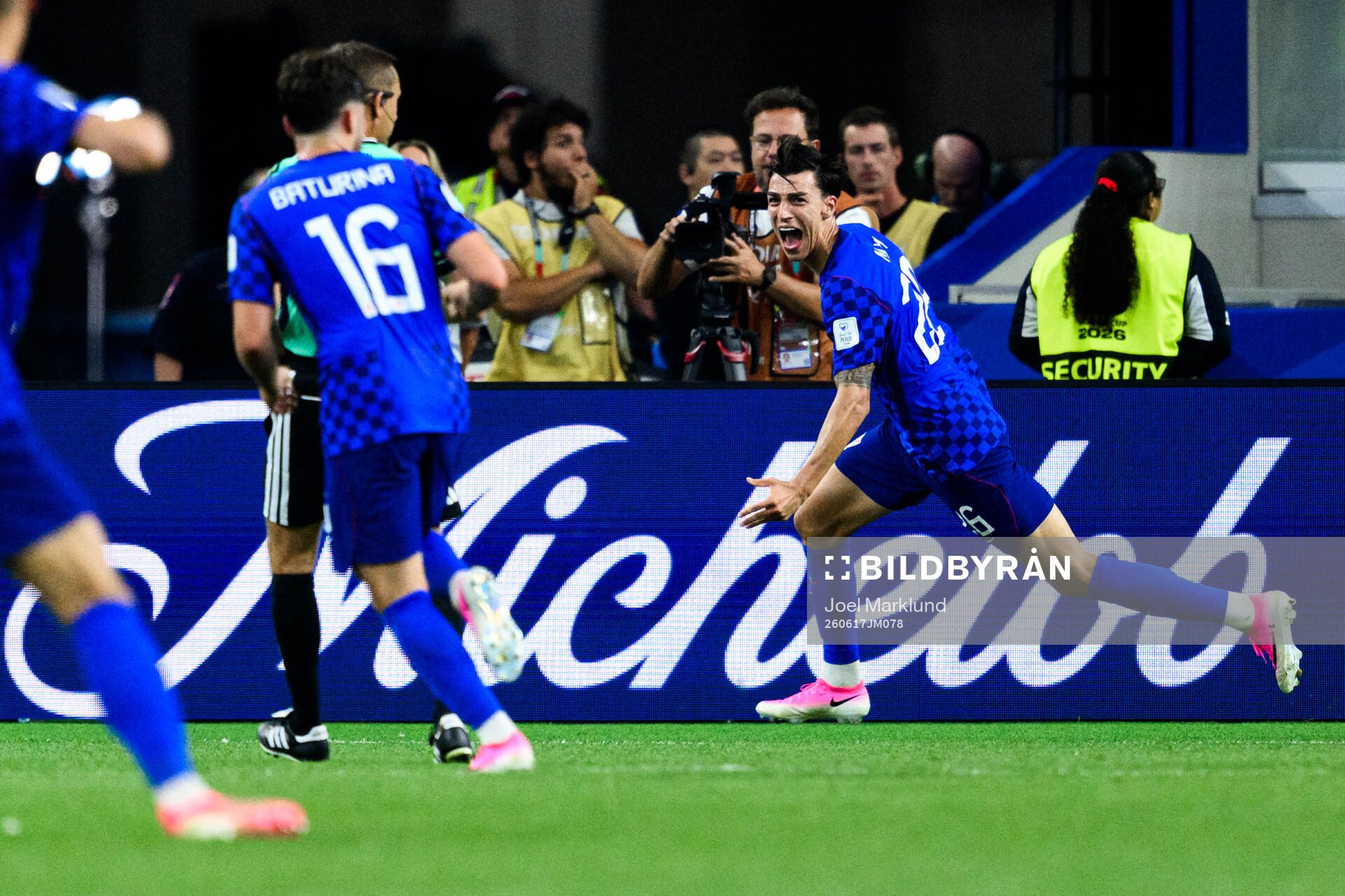 Petar Musa of Croatia celebrates scoring 2-2